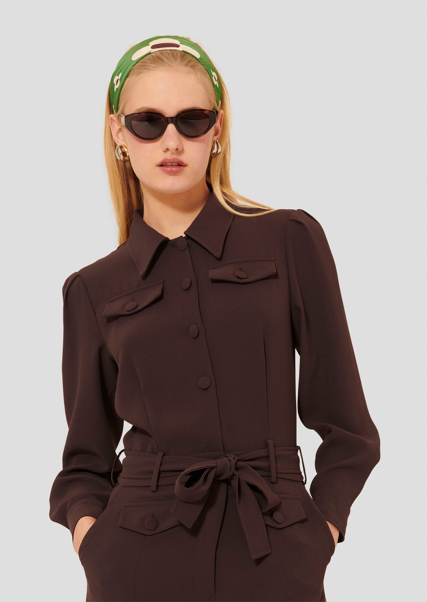 Model wearing Tara Jarmon crepe brown jumpsuit.