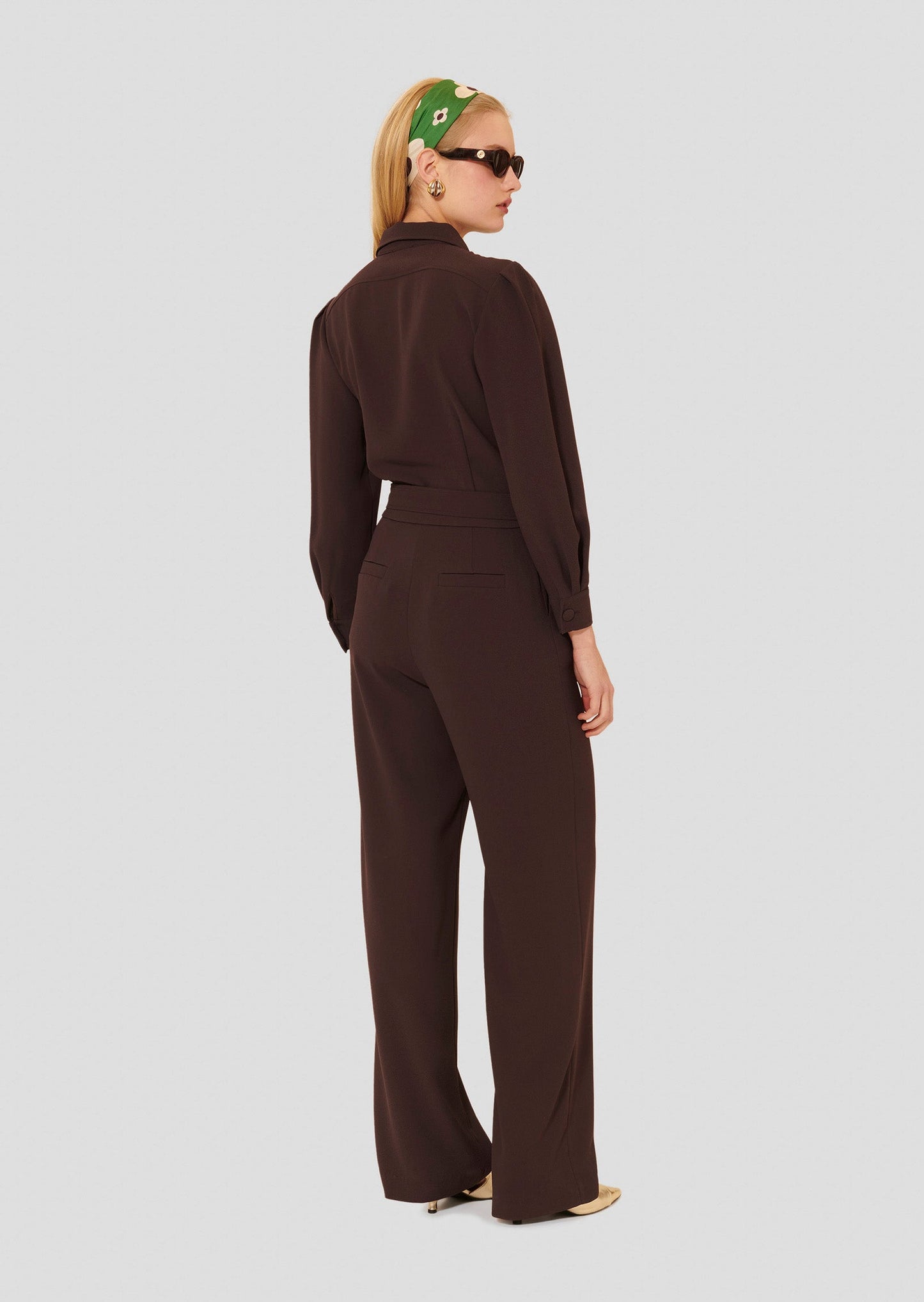Brown crepe jumpsuit adjustable belt waist.