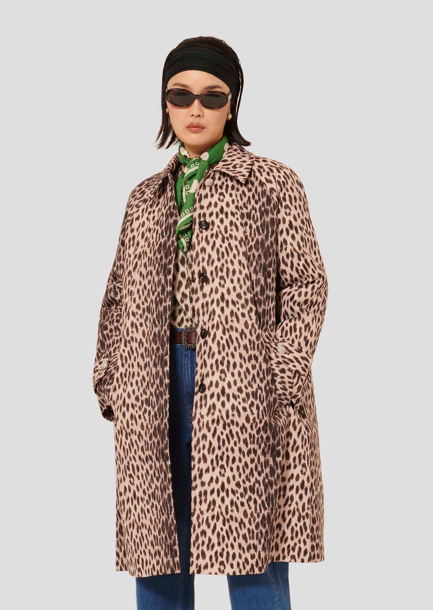 Model wearing Tara Jarmon Leopard Print Coat with Shirt Collar and Rhinestone Buttons.