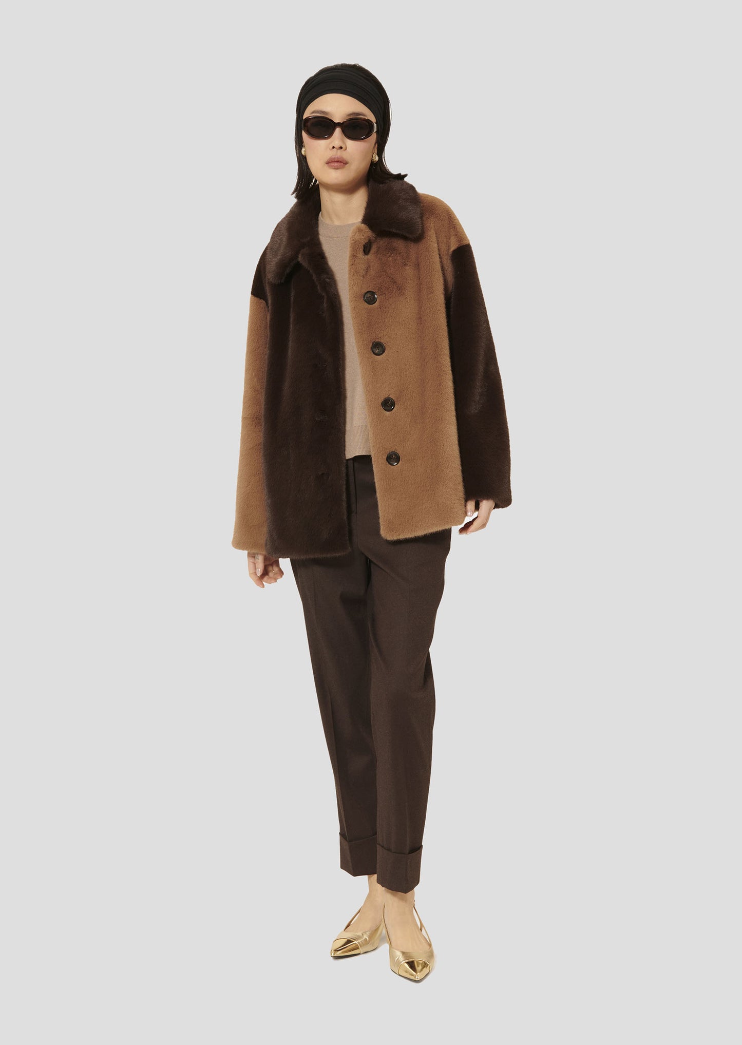 Warm Chocolate Faux-Fur Coat with Long Sleeves and Buttoned Closure.