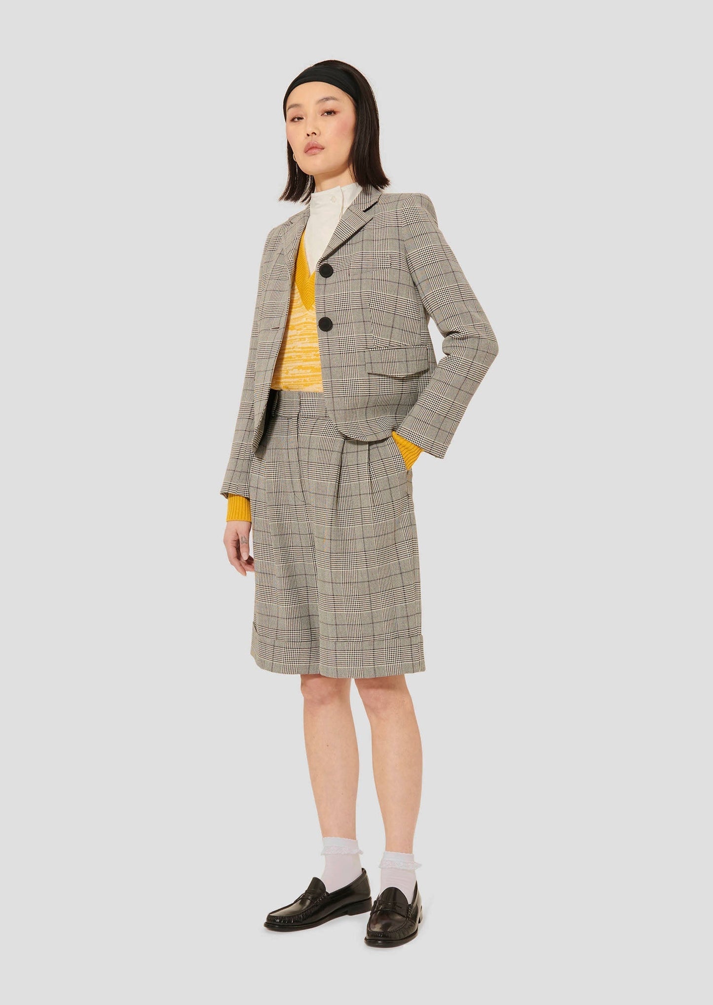 Women's Grey Suit Jacket Featuring a Classic Plaid Pattern.