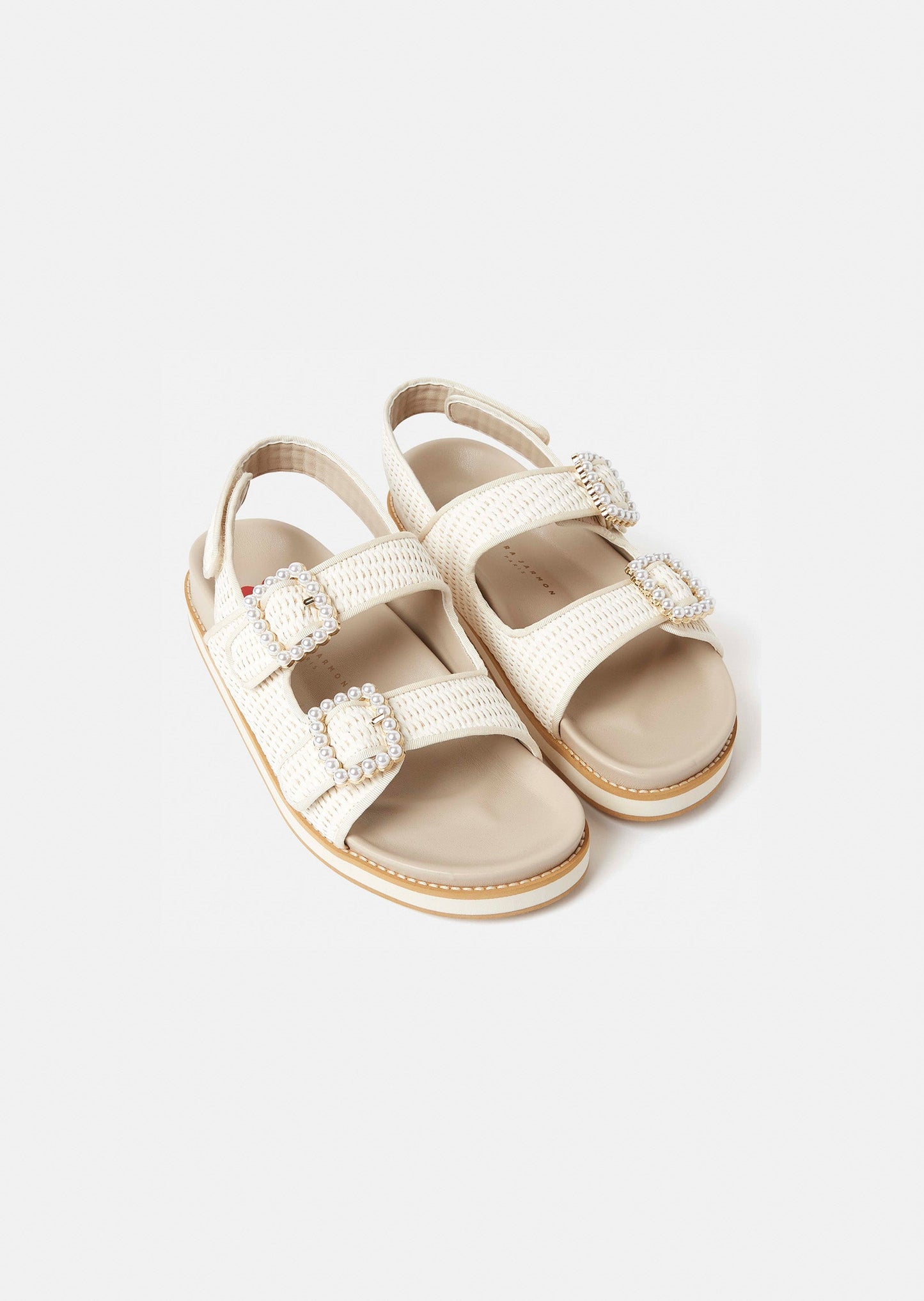 Comfortable Raffia Sandals with Round Toe and Velcro Closure.