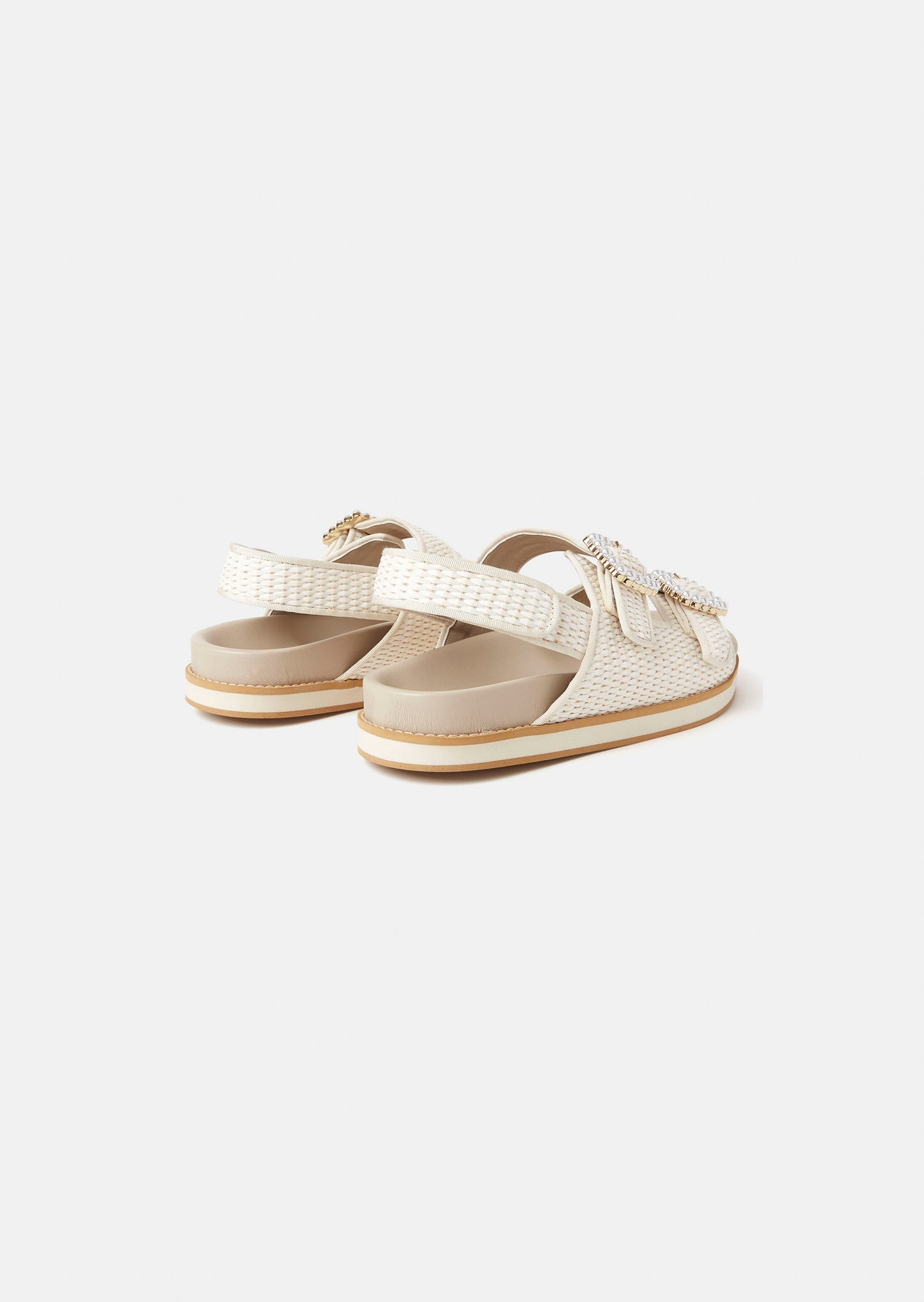 Stylish Sandals with Braided Straps and Beaded Detail.