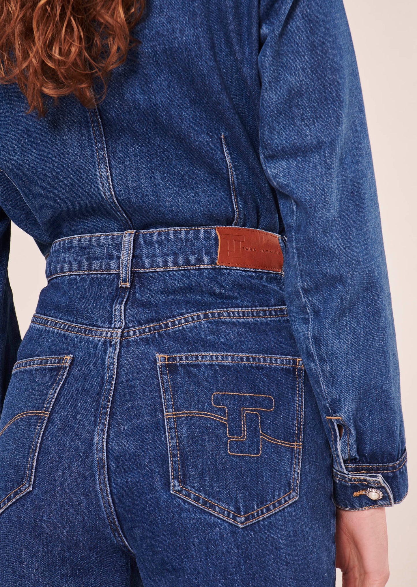 Straight cut fitted blue denim jeans.