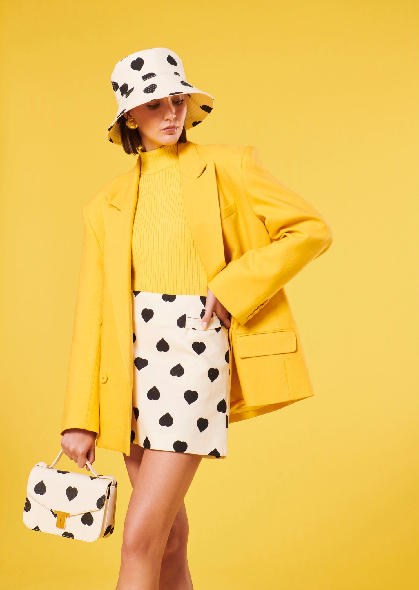 Short heart print ecru skirt with matching bucket hat.