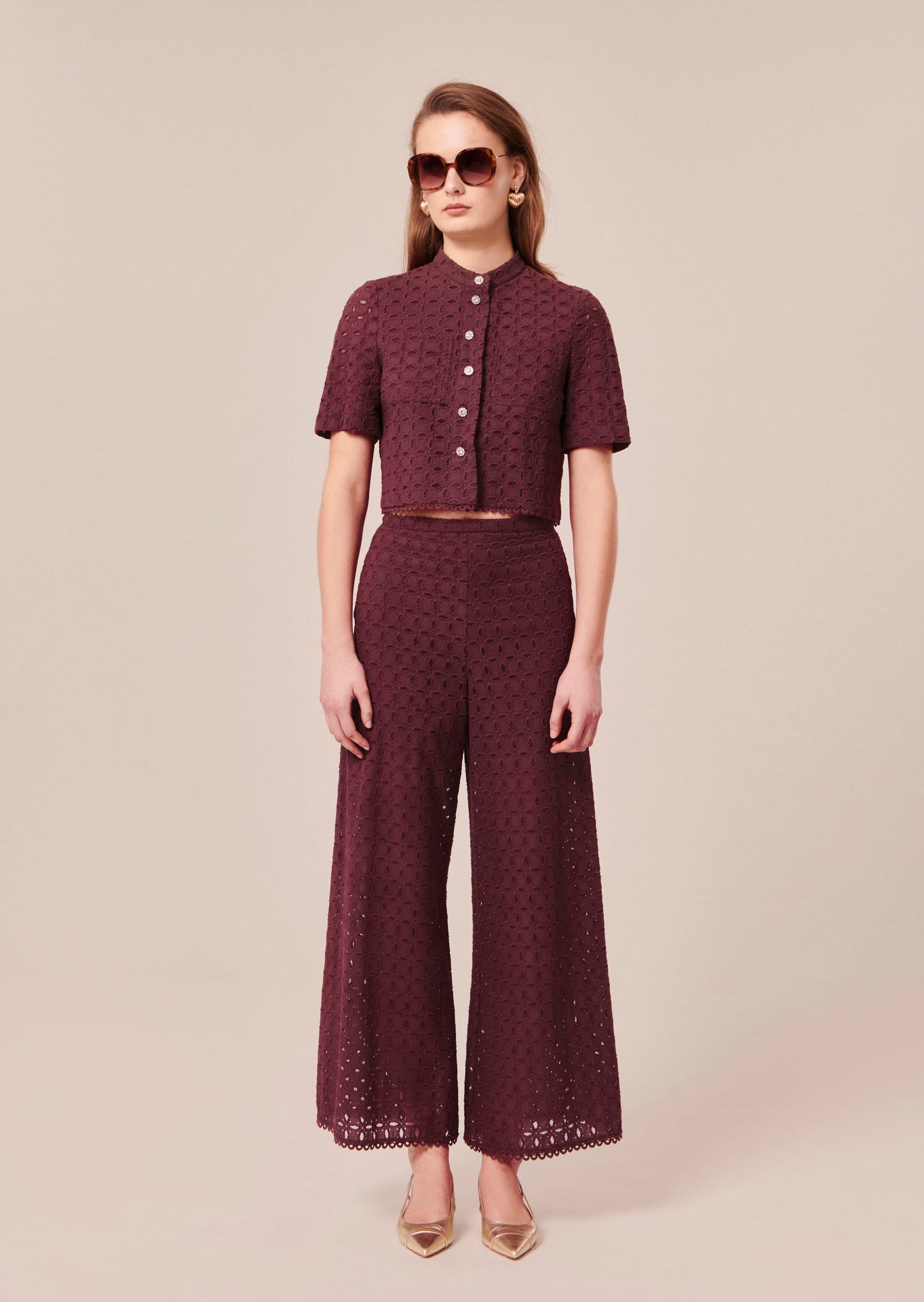 Wide leg high-waist chocolate-colored pants with matching embroidered short sleeve top.