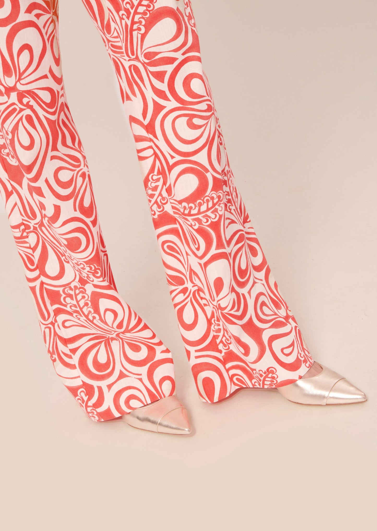 100% cotton high waist pants featuring a coral graphic print on an ecru background.