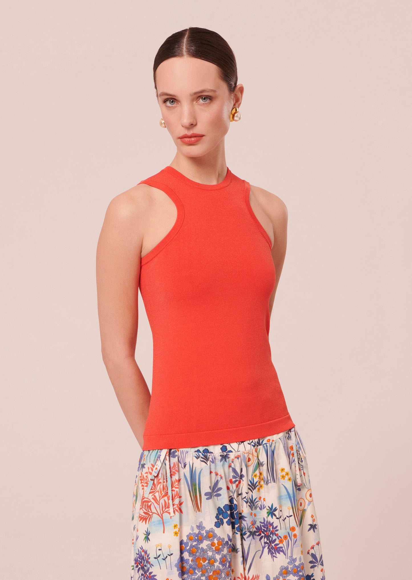 Sleeveless coral top.