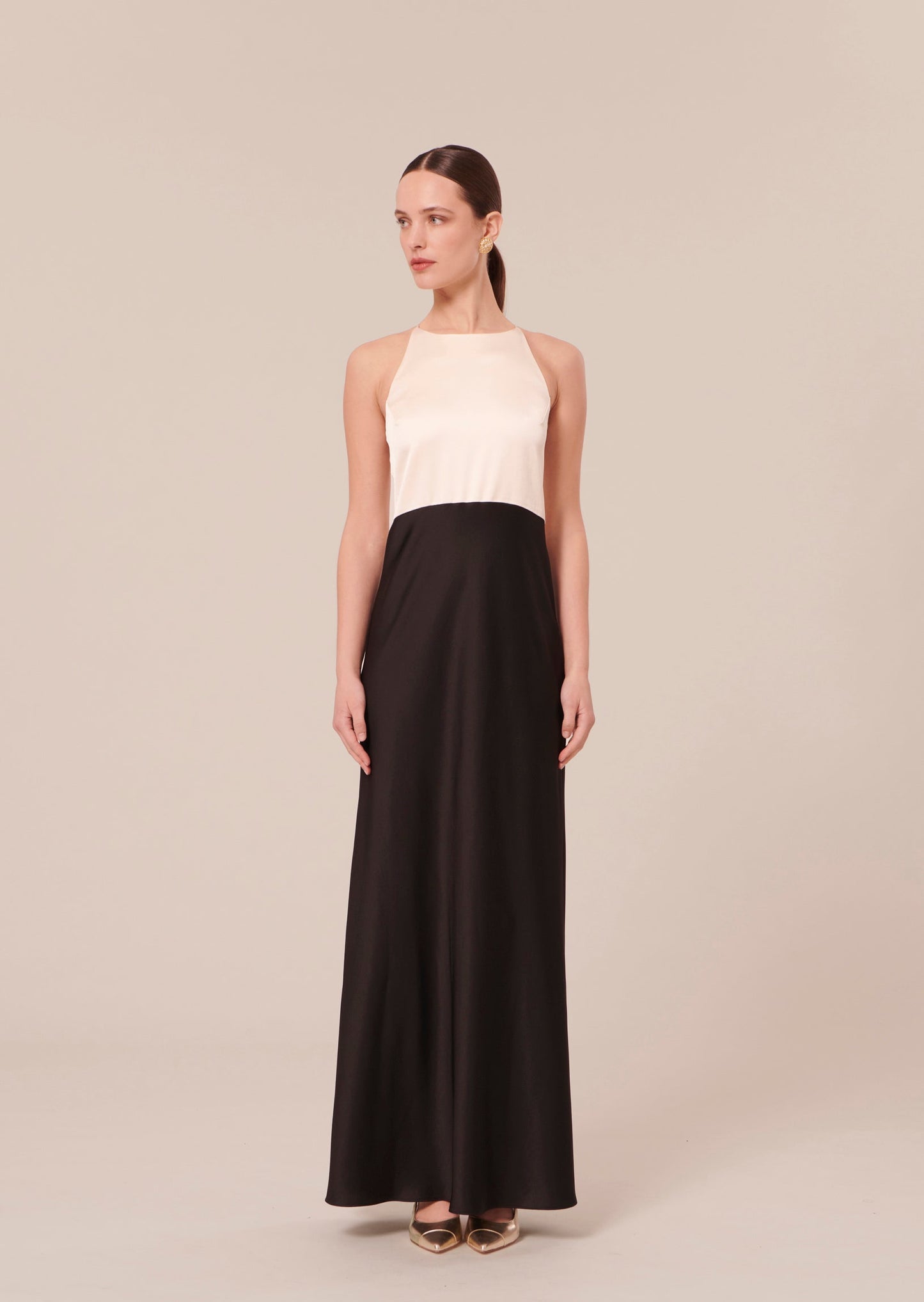 Elegant Black and White Satin Dress with Strappy Back Detail.
