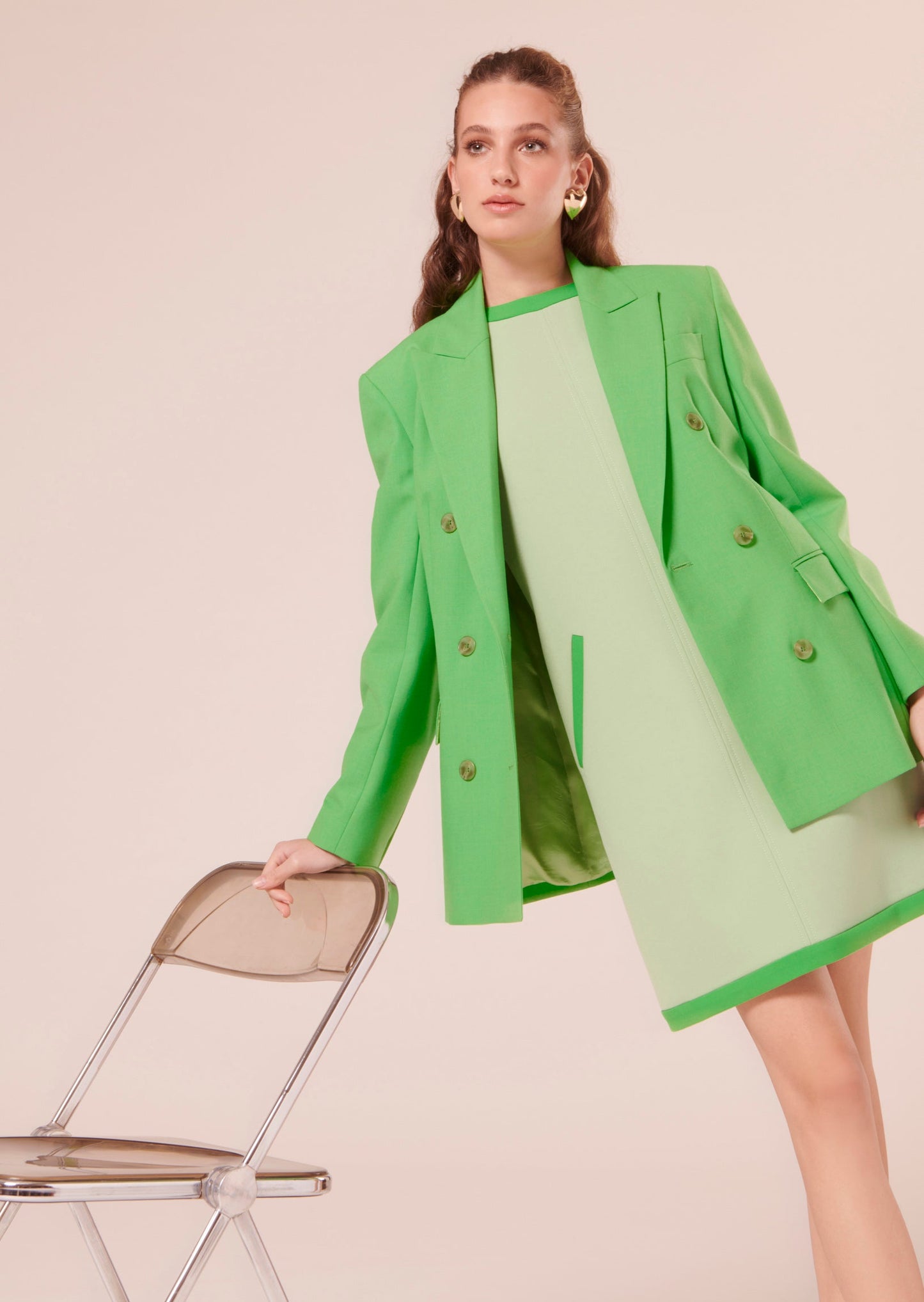 Short Dress with 70s-Inspired Silhouette with Hidden Zip matching with a green blazer.
