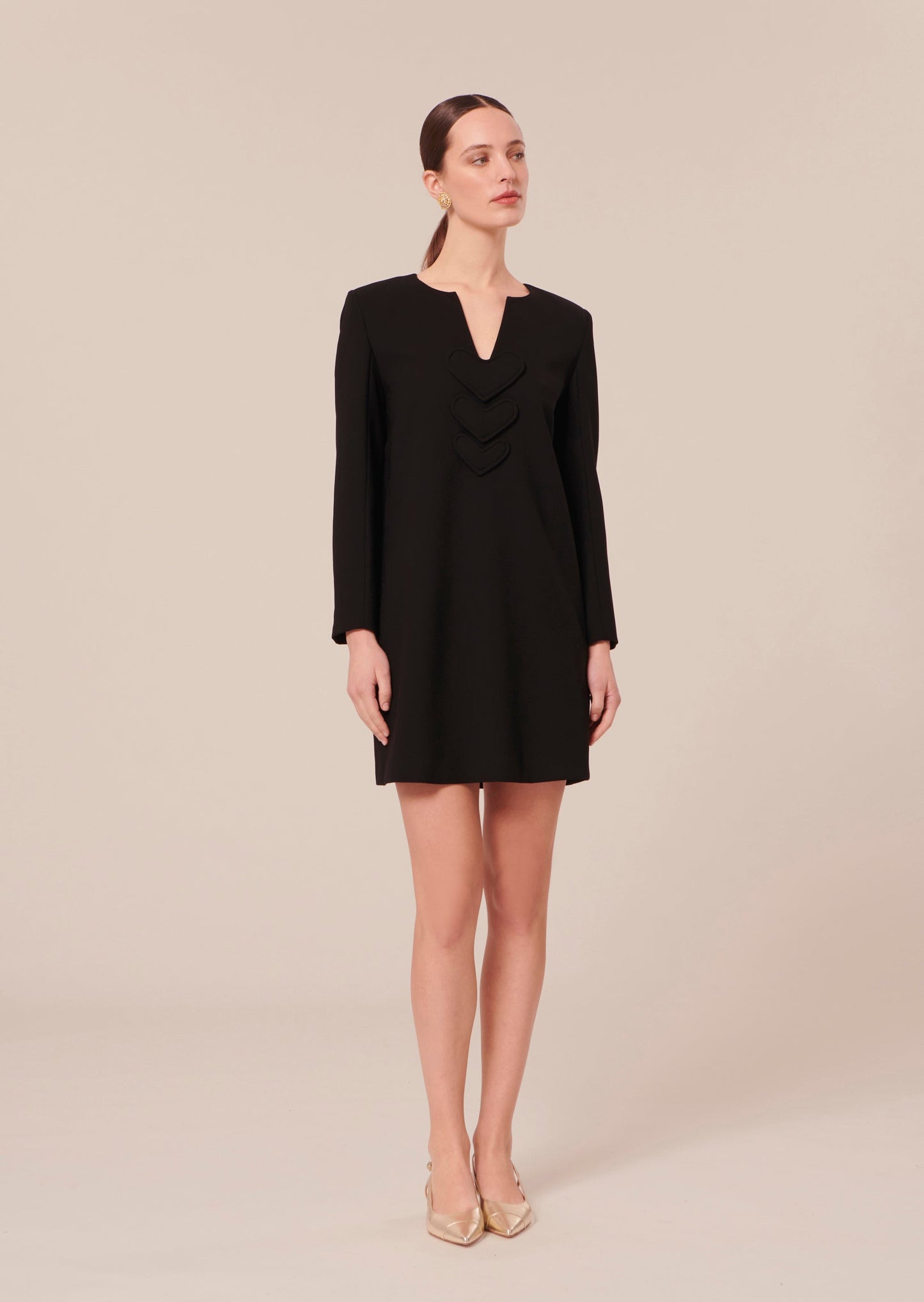 Model wearing Tara Jarmon Short Black Crepe Dress with Heart Details.
