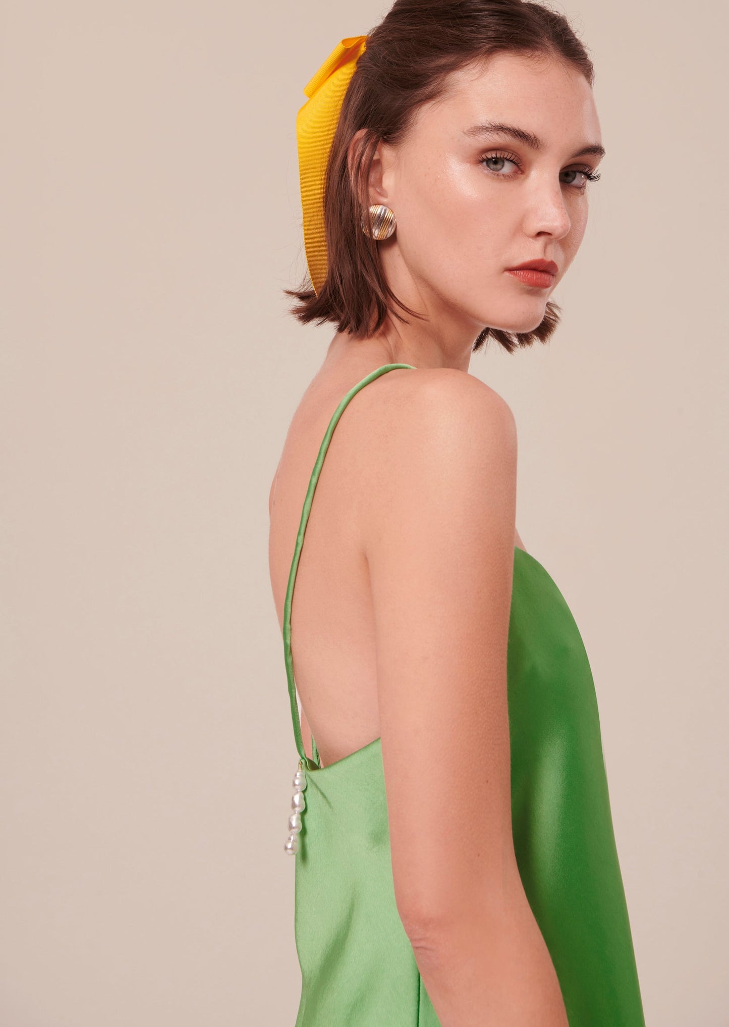 Elegant Satin Green Tank Top with Strappy Back and Side Slit.
