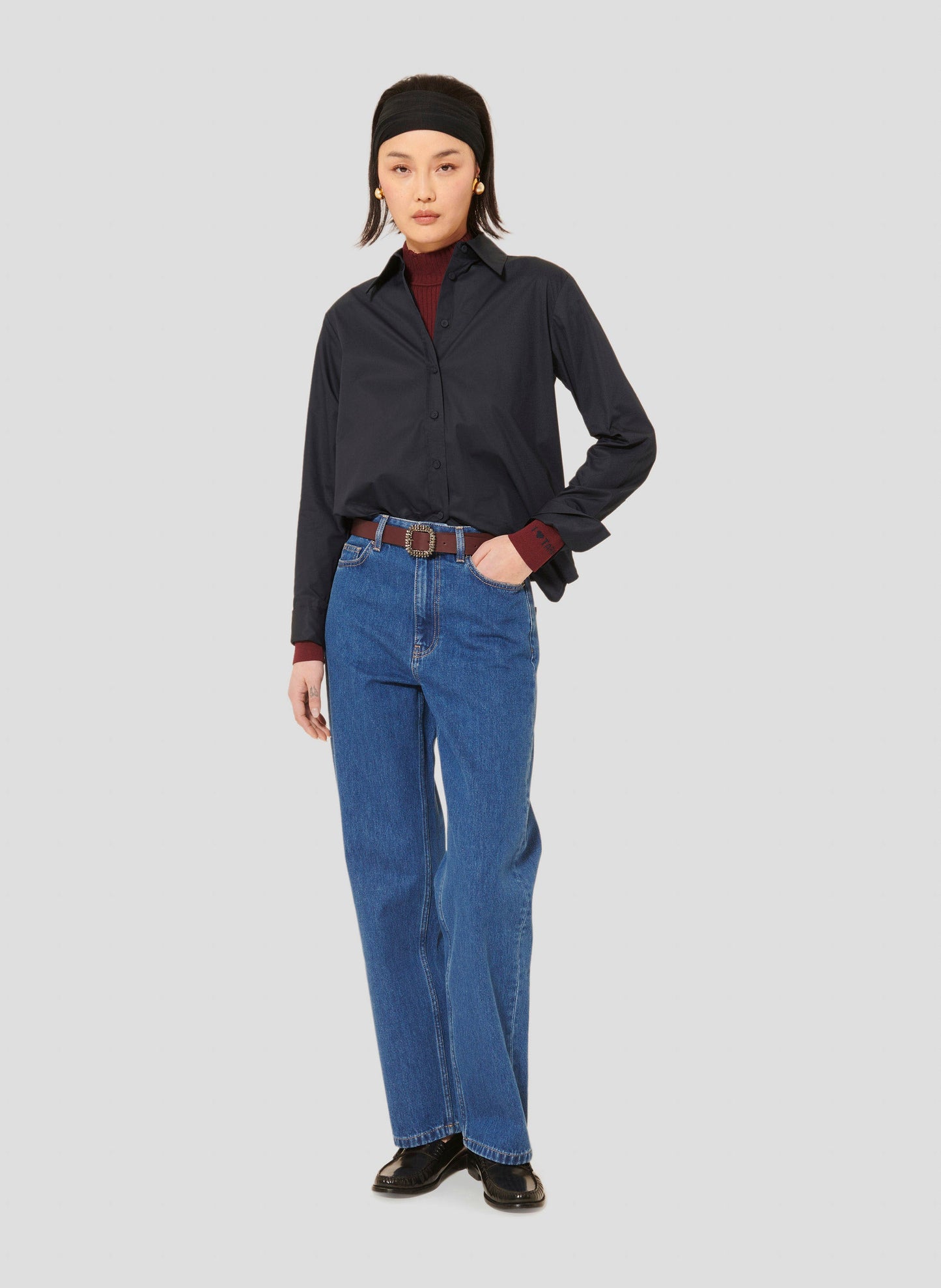 Modern Midnight Blue Shirt with Buttoned Cuffs and Embroidered Tara Jarmon Logo with Straight Cut Jeans.