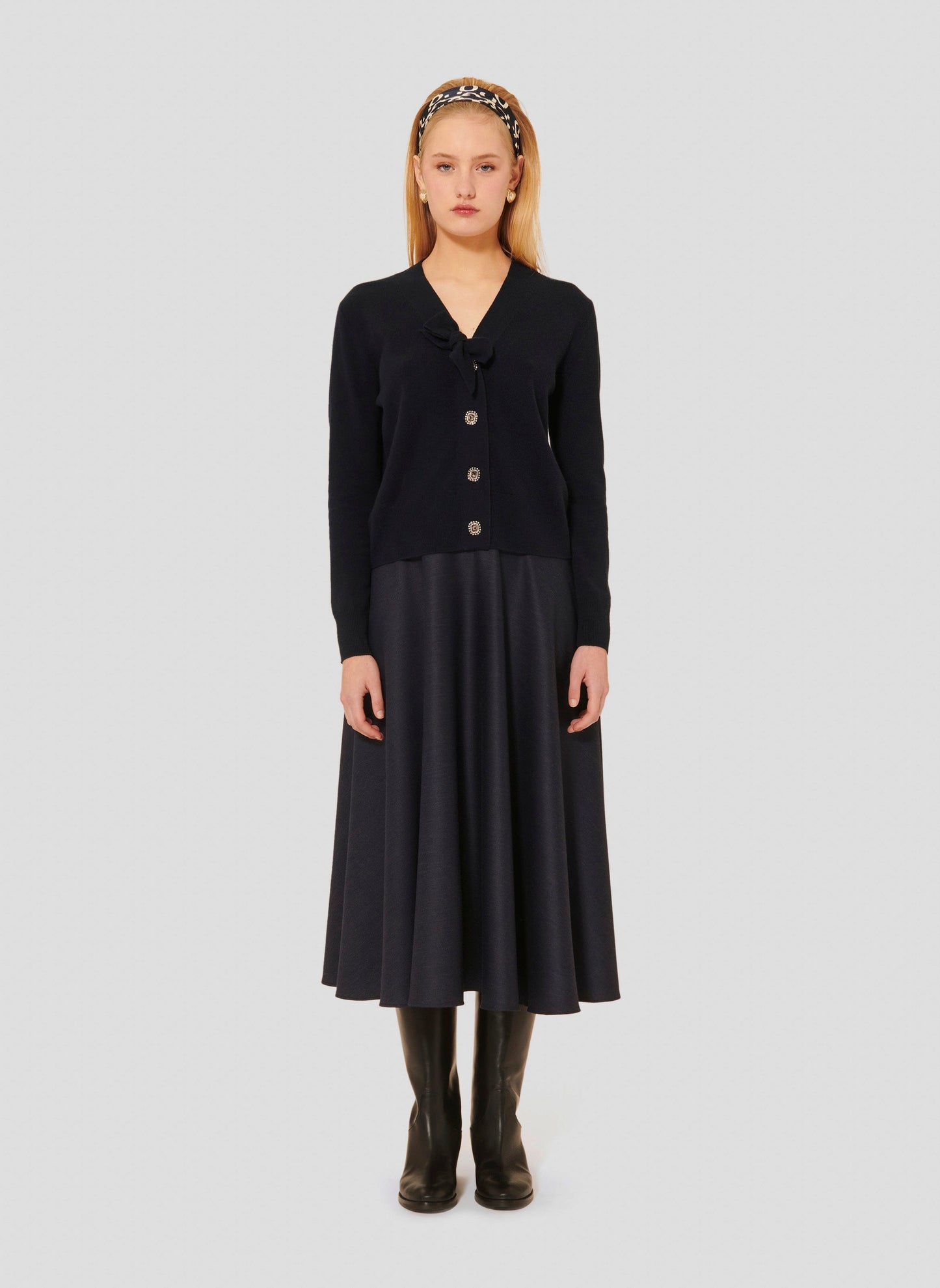 Cozy Midnight Blue Wool Sweater with V-Neck and Tie Closure.