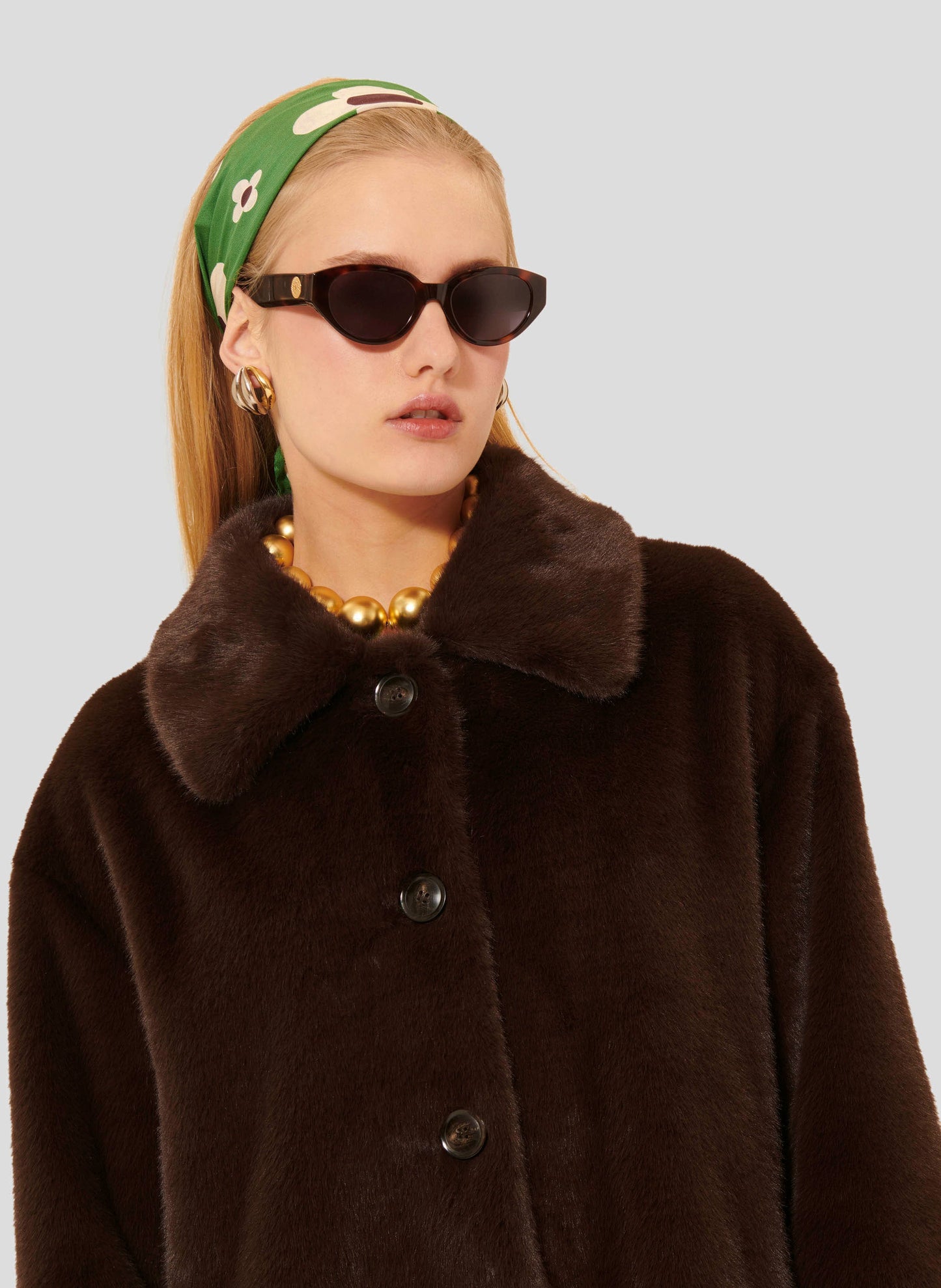 Brown chocolate faux fur coat, with large buttons.