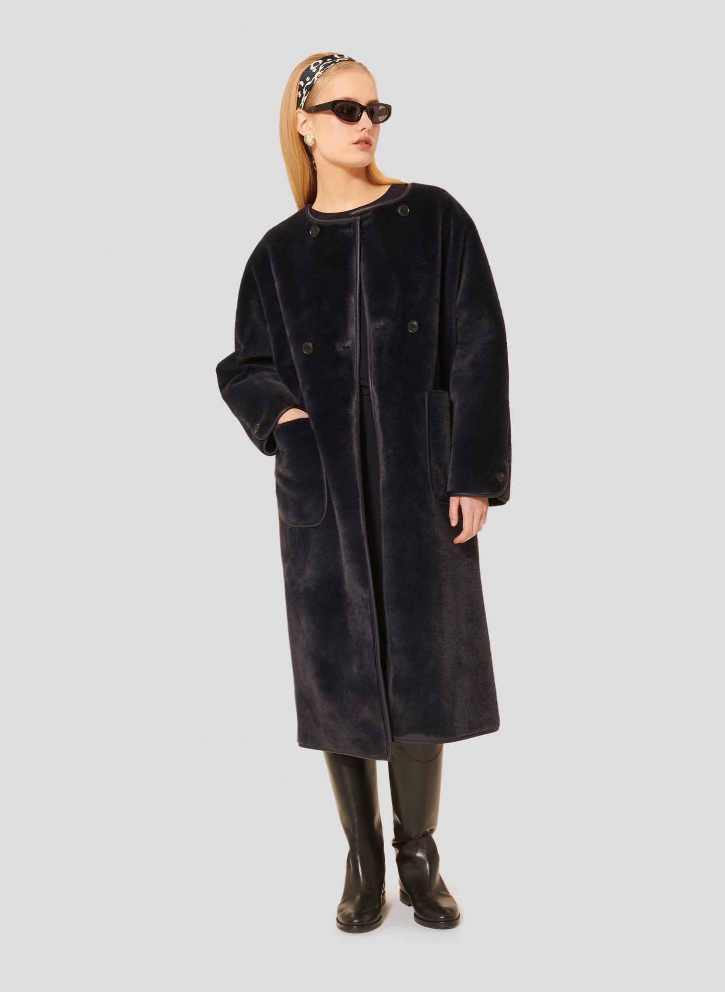 Tara Jarmon midnight blue faux fur coat with round collar.