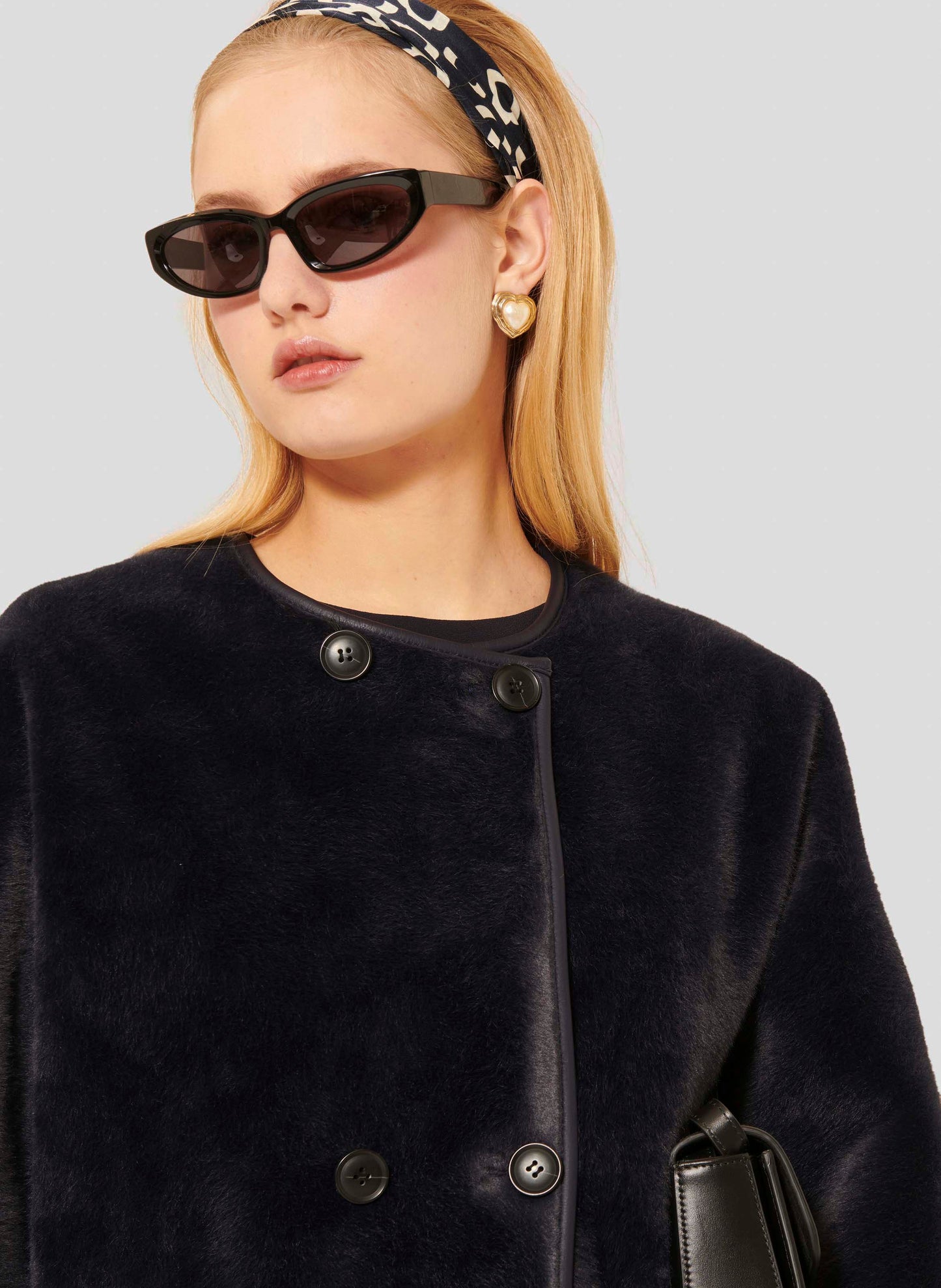 Midnight Blue Faux Fur Coat with Asymmetrical Button Closure, Buttoned Cuffs, and Flap Pockets.