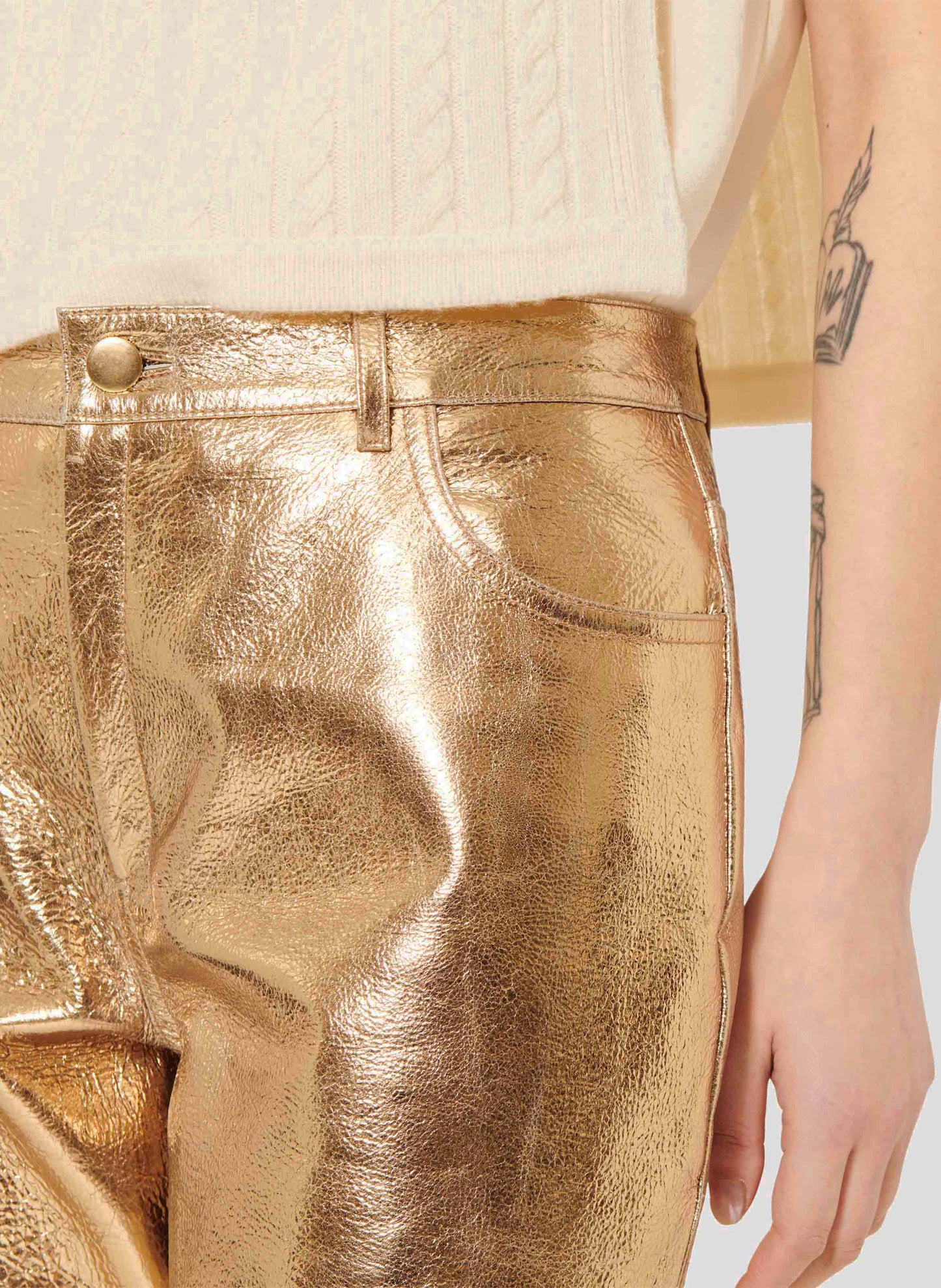 Leather Pants in Gold with Side Pockets and Zip Closure.
