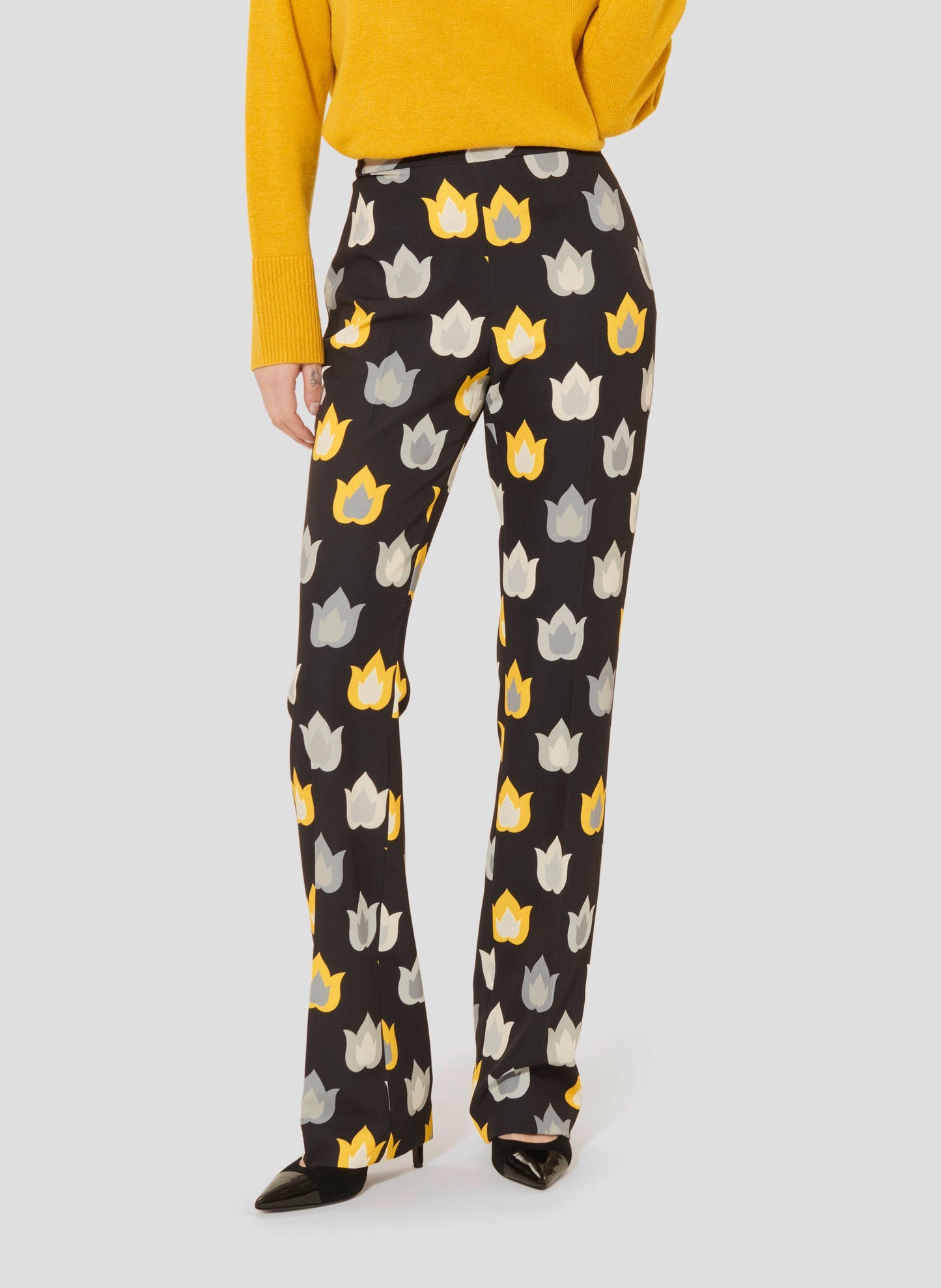 Straight cut mid-rise waist pants with flame print.