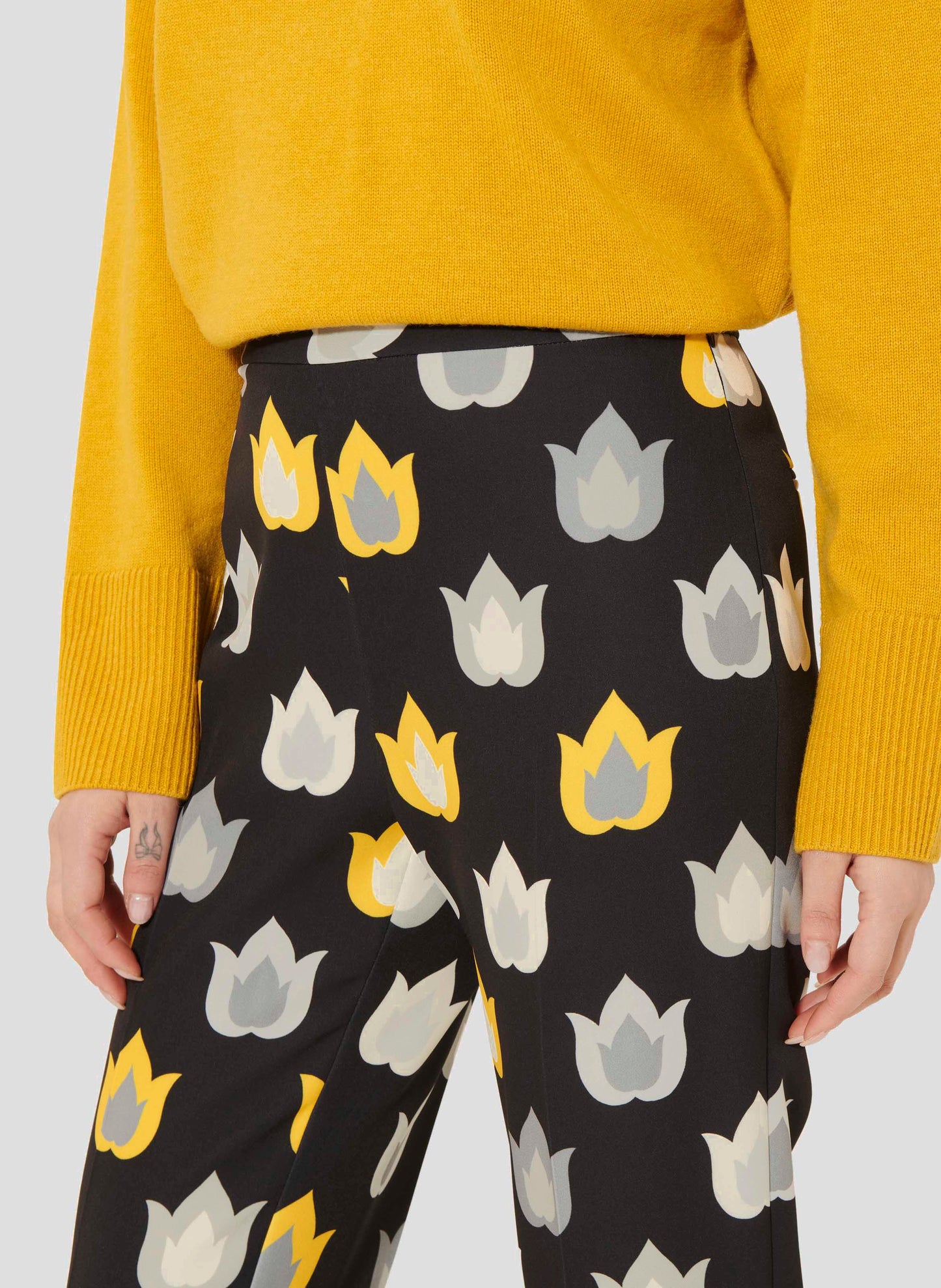 Stretch fabric, straight cut flame print pants.