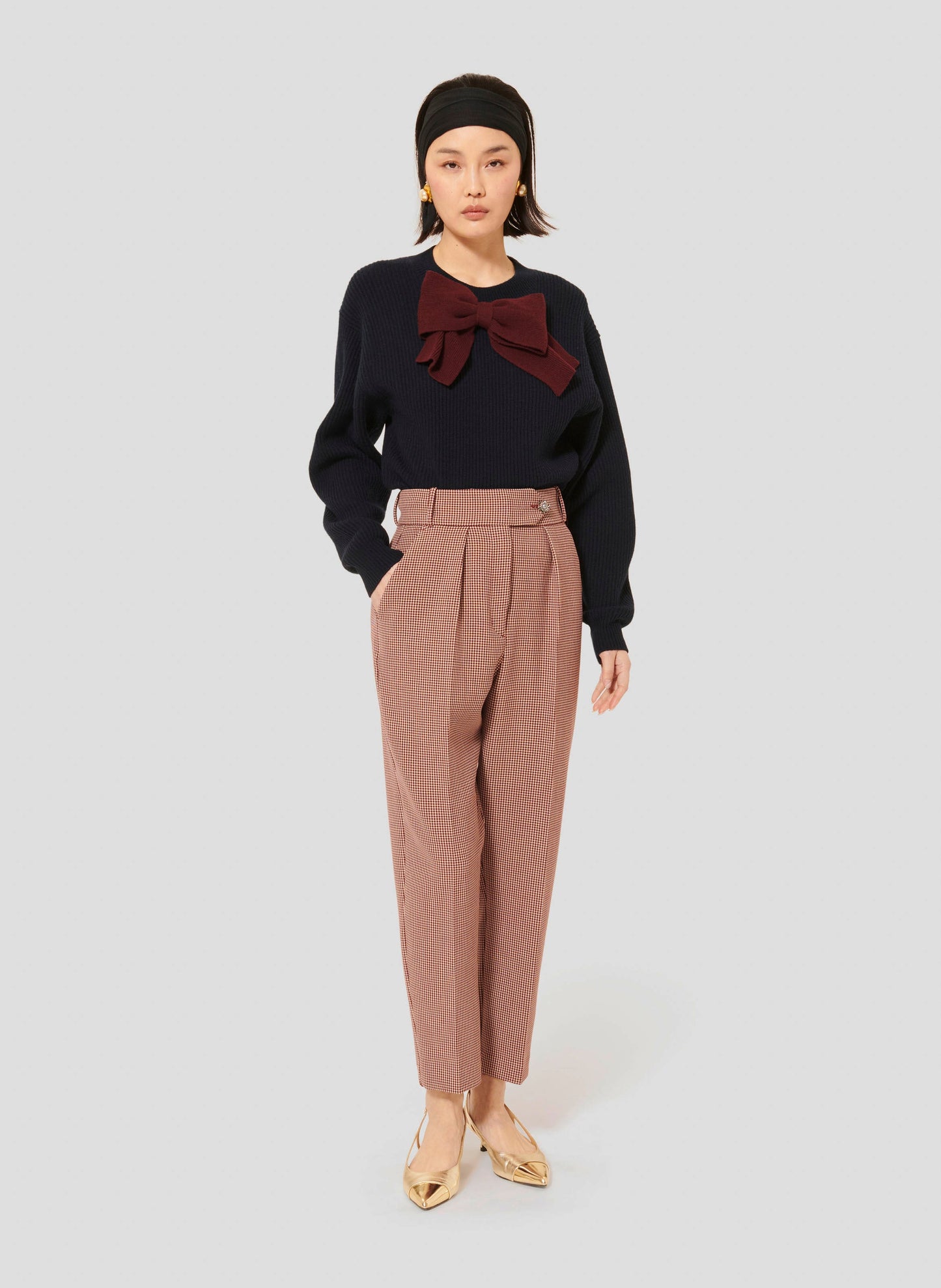 Burgundy Flea-Foot Print Pants with Pleated Front and Jewel Button.