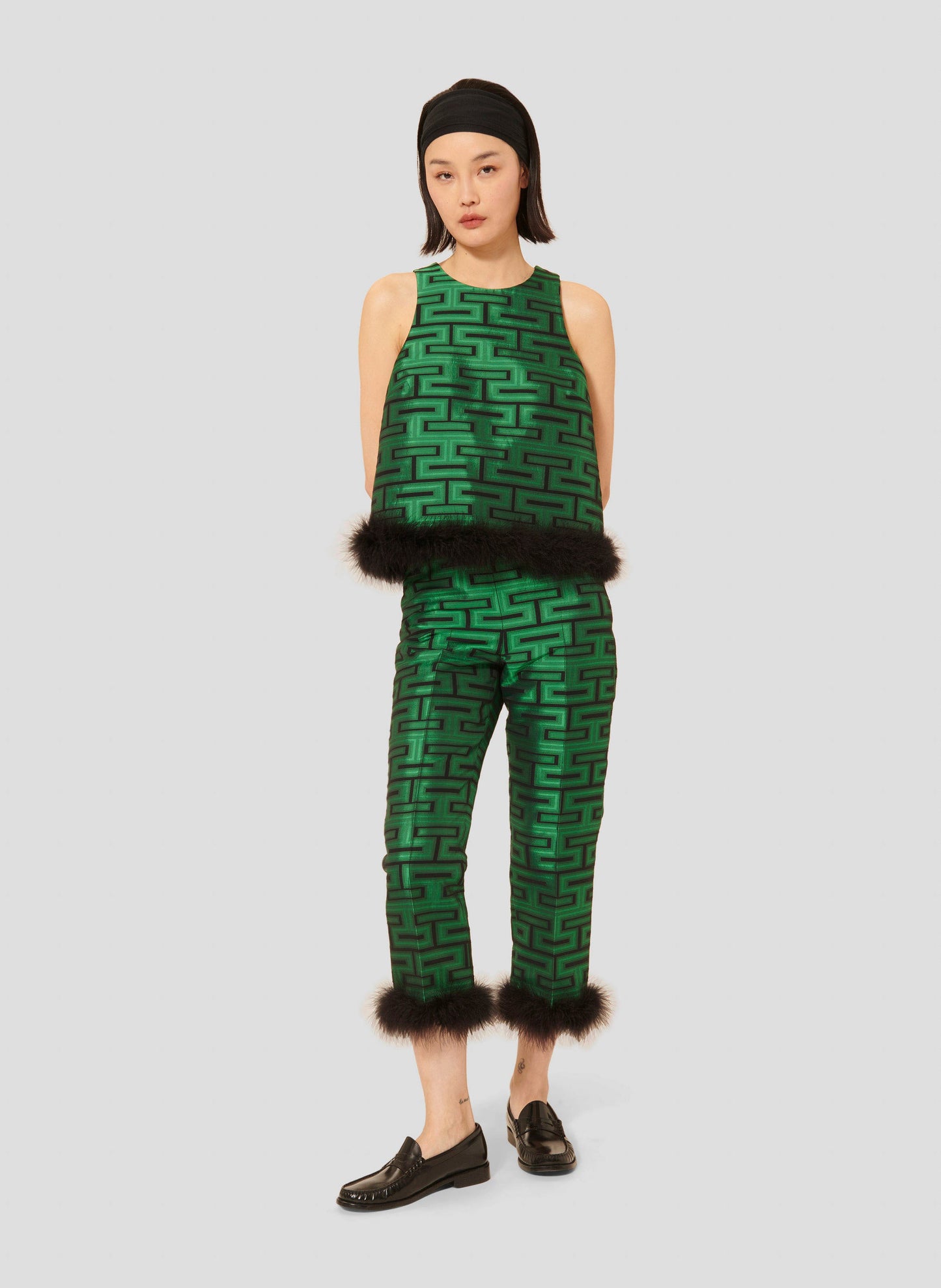 Green Graphic Print Pants with Faux Fur Trim and Side Pockets.