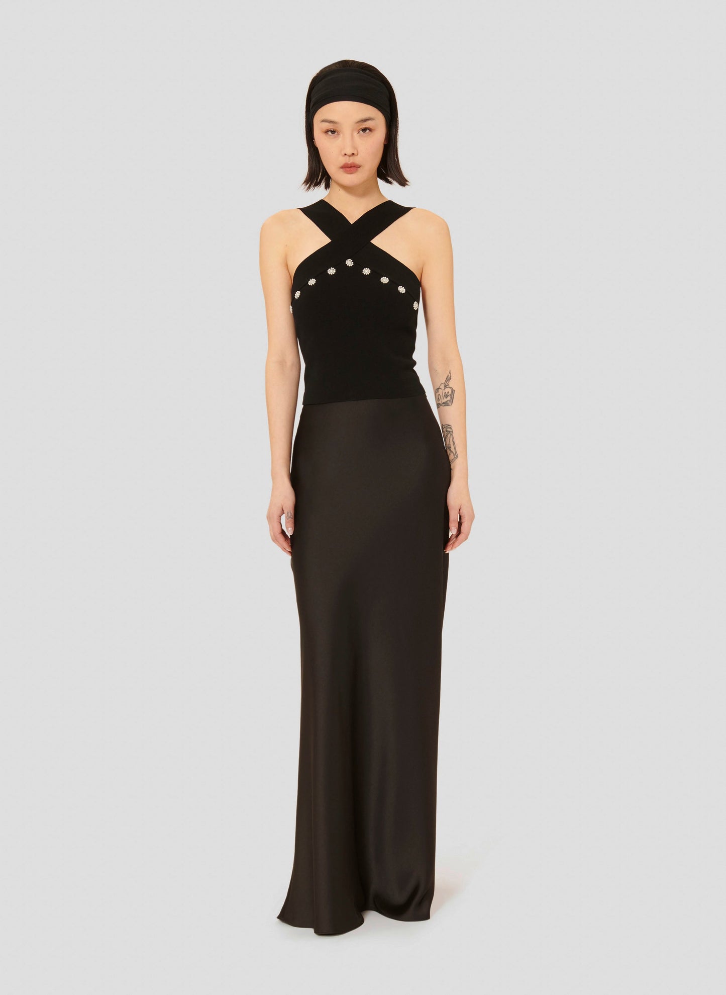 Sleeveless Top with Criss-Cross Back and Floral Detail in Front.