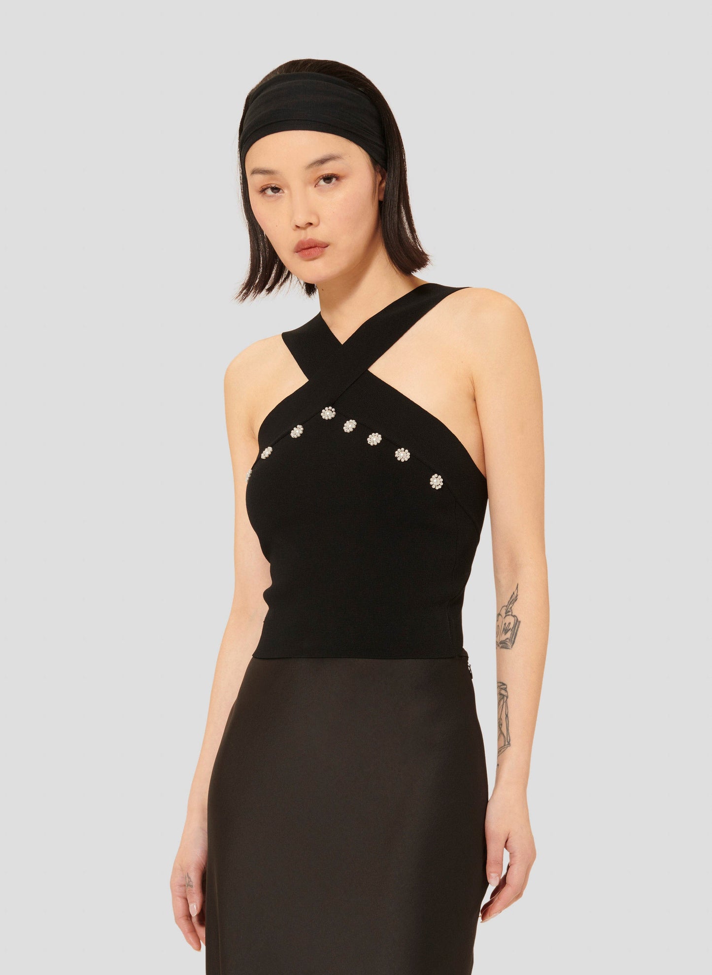 Black Cropped Top with Waffle Knit and Pearl Embellishments.