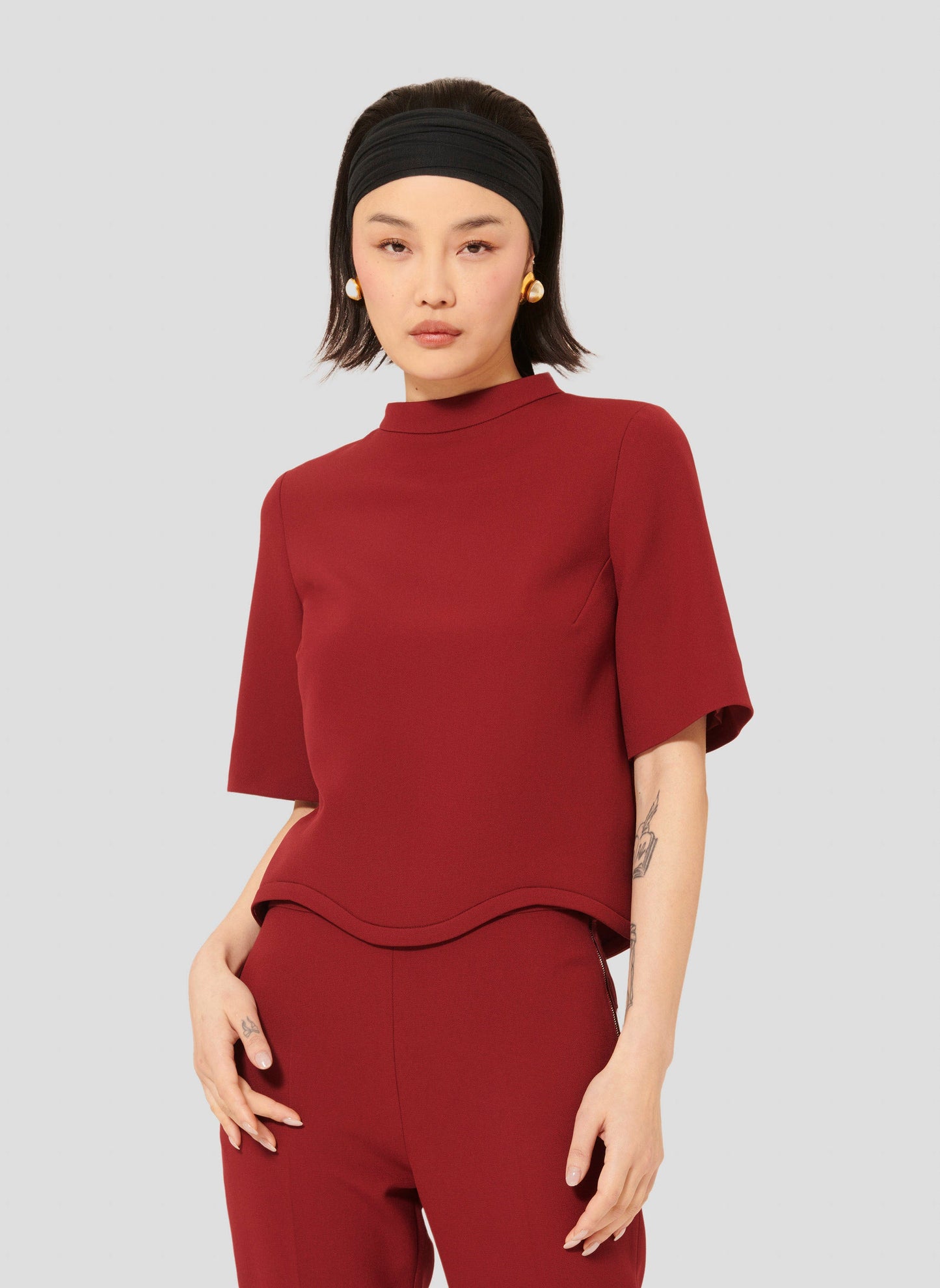 Versatile Burgundy Top with Scalloped Detail and Invisible Zip.