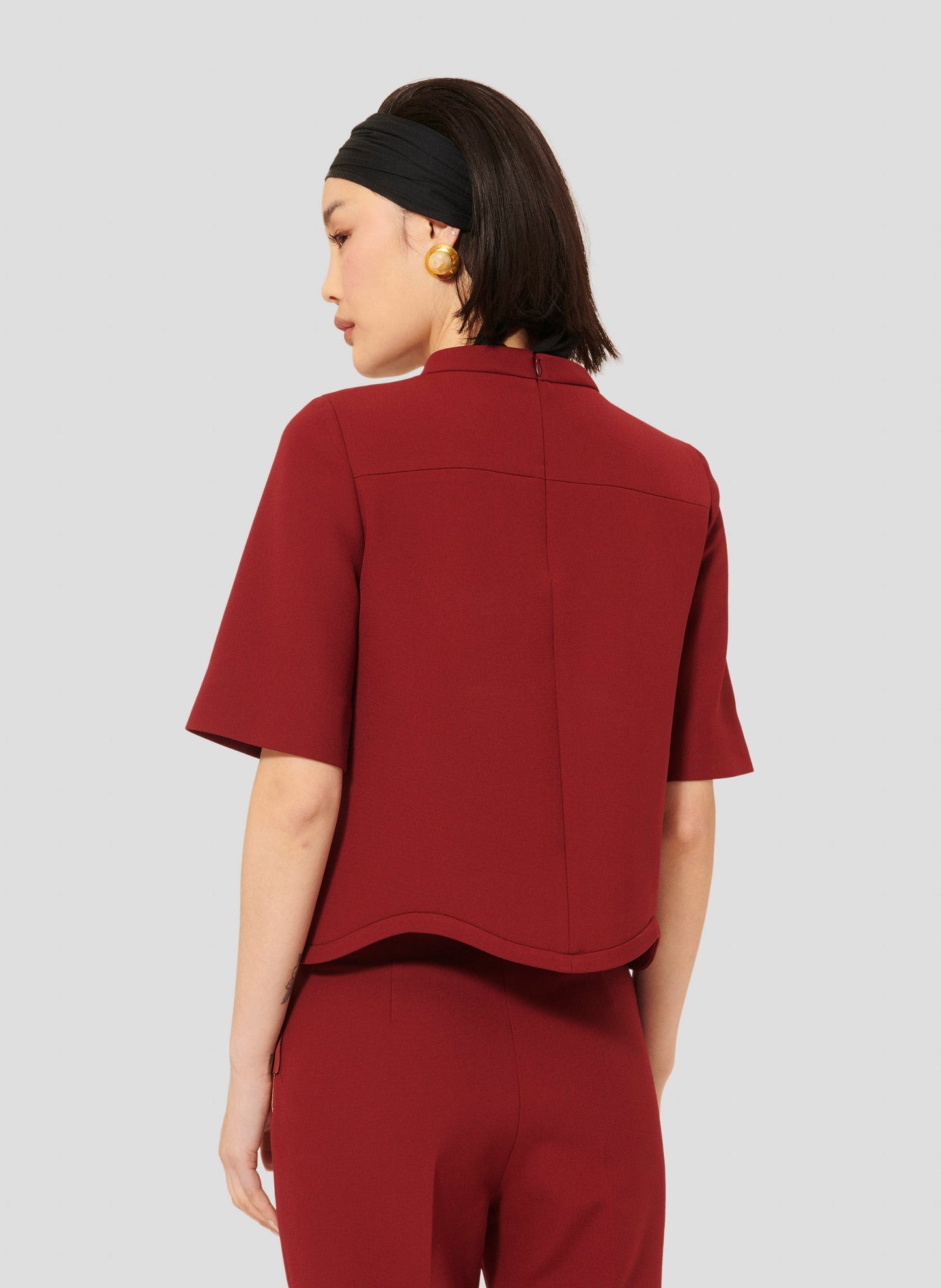 Preppy Burgundy Top with Scalloped Hem and Round Neckline.