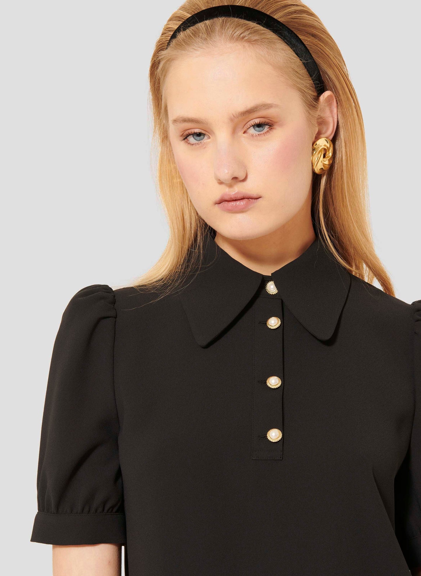 Black Short Sleeves Top with Jeweled Buttons.