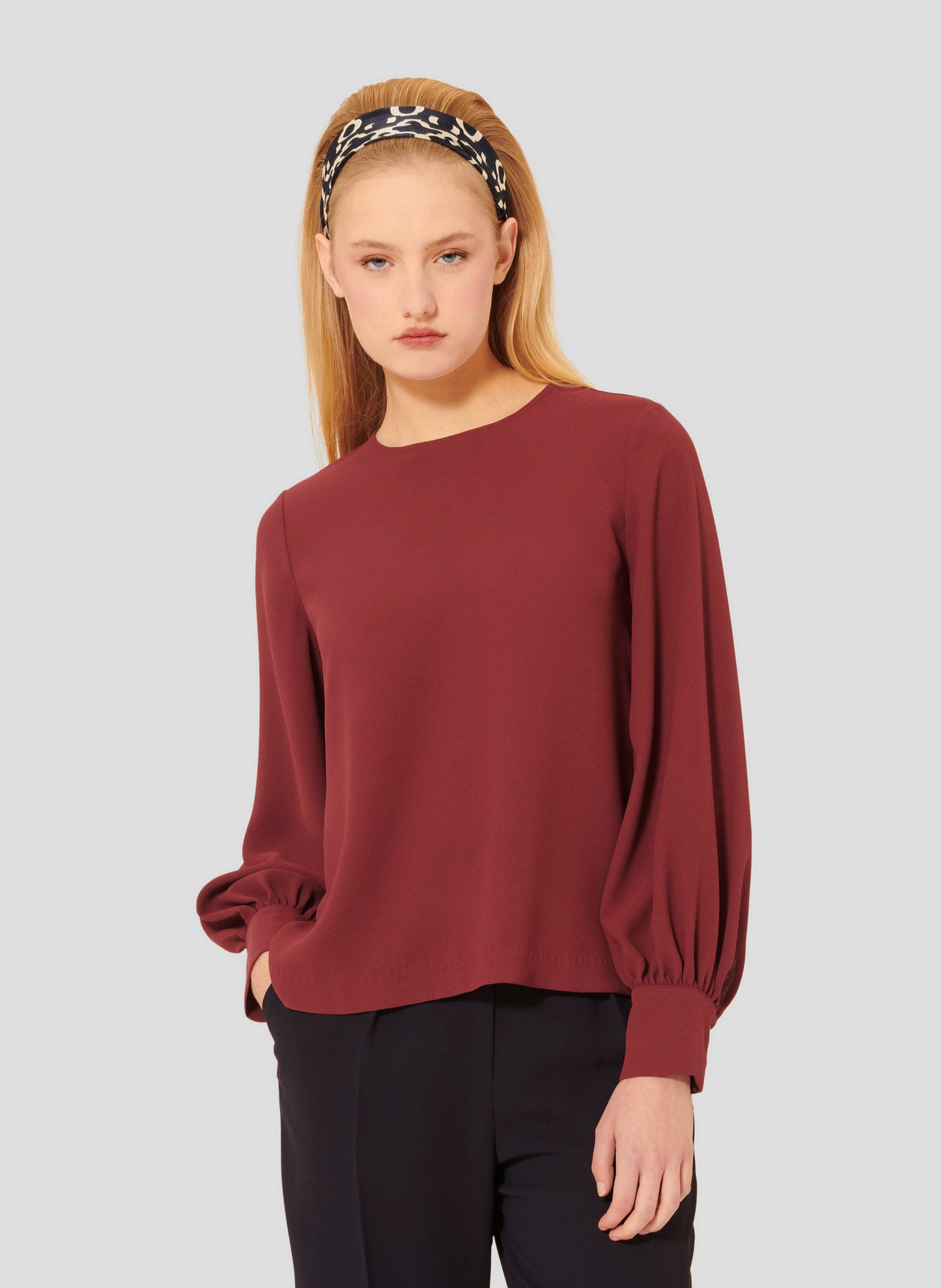 Burgundy Crepe Top with Long Sleeves and Buttoned Cuffs.