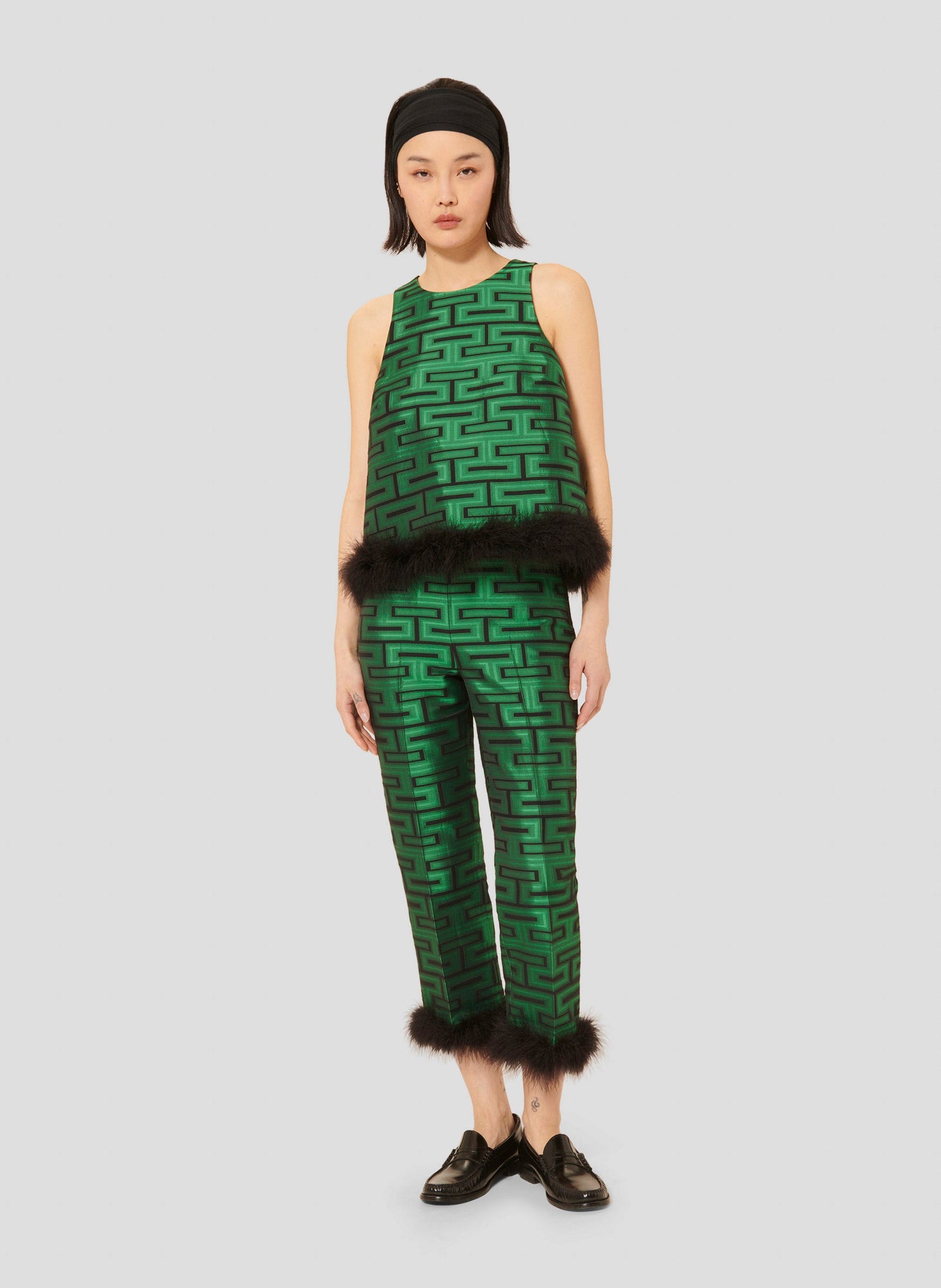 Stylish Green Top with Round Neckline and Fur Detail.
