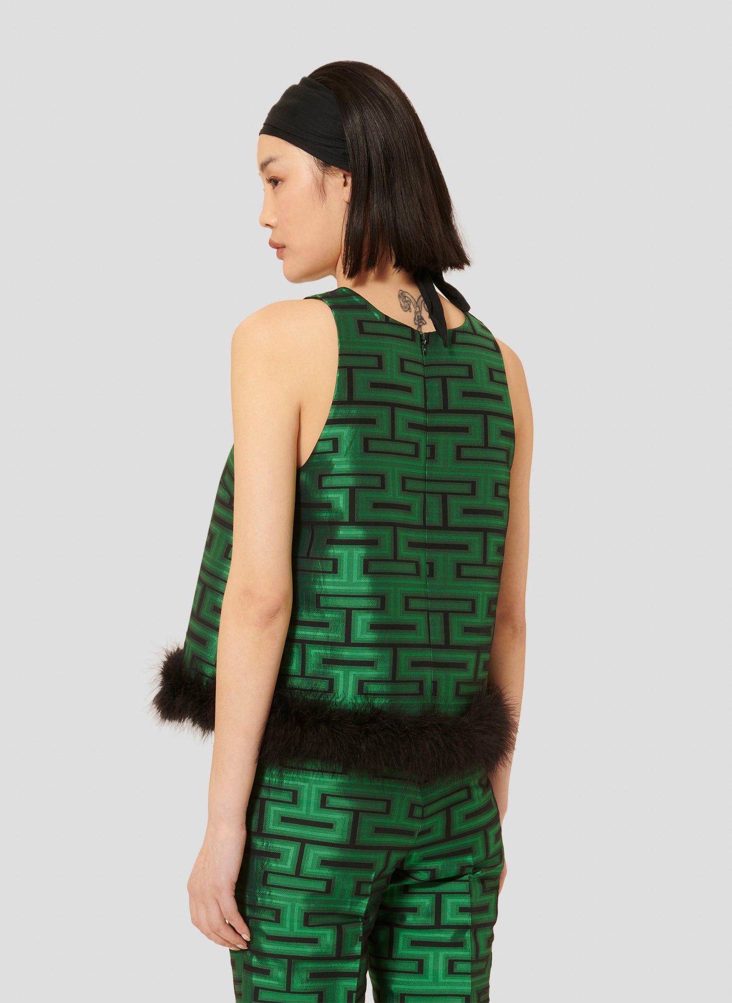 Graphic Green Top with Fur Trim.