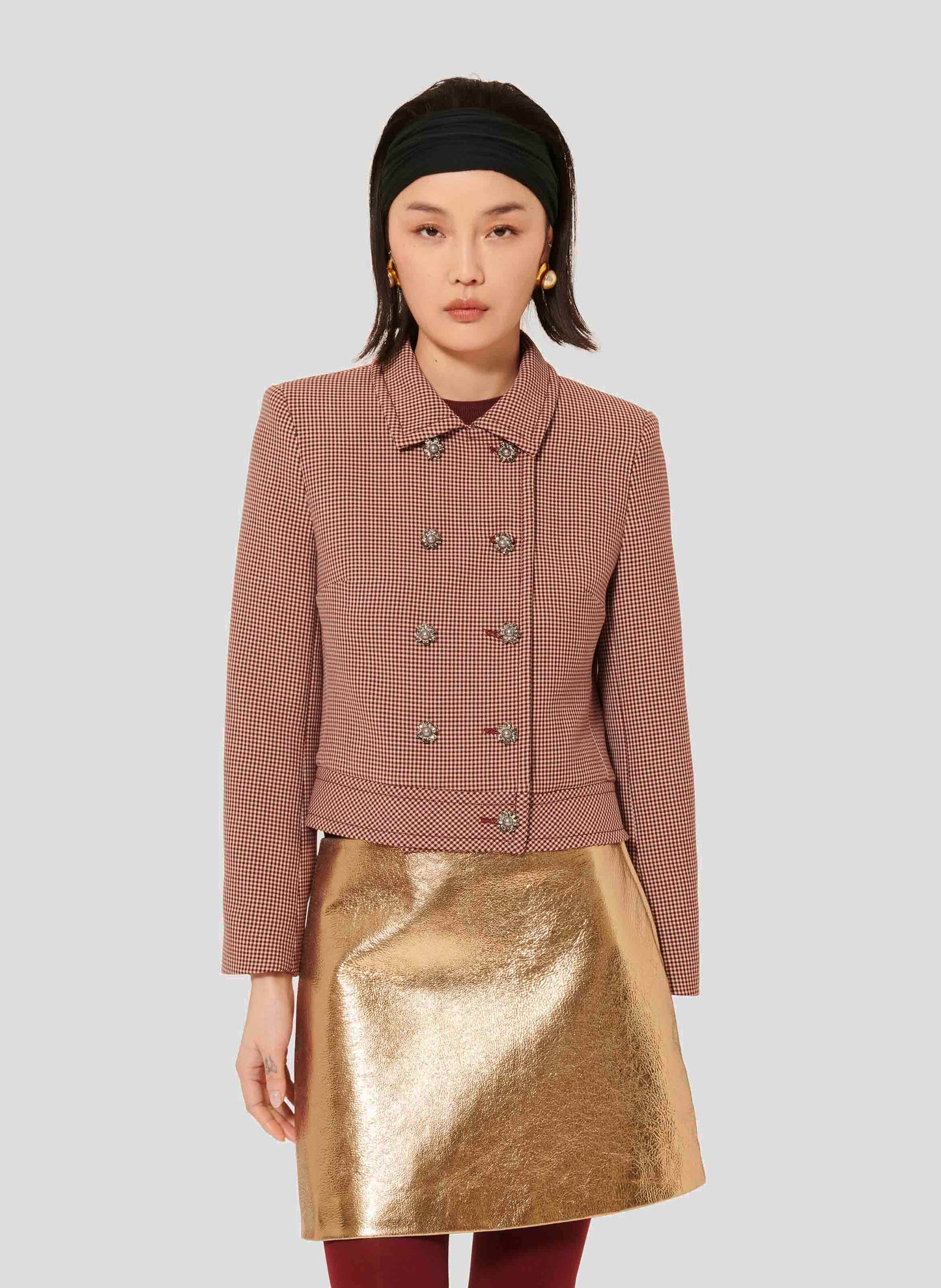 Burgundy Jacket with Jewel-Embellished Buttons and Shoulder Pads.