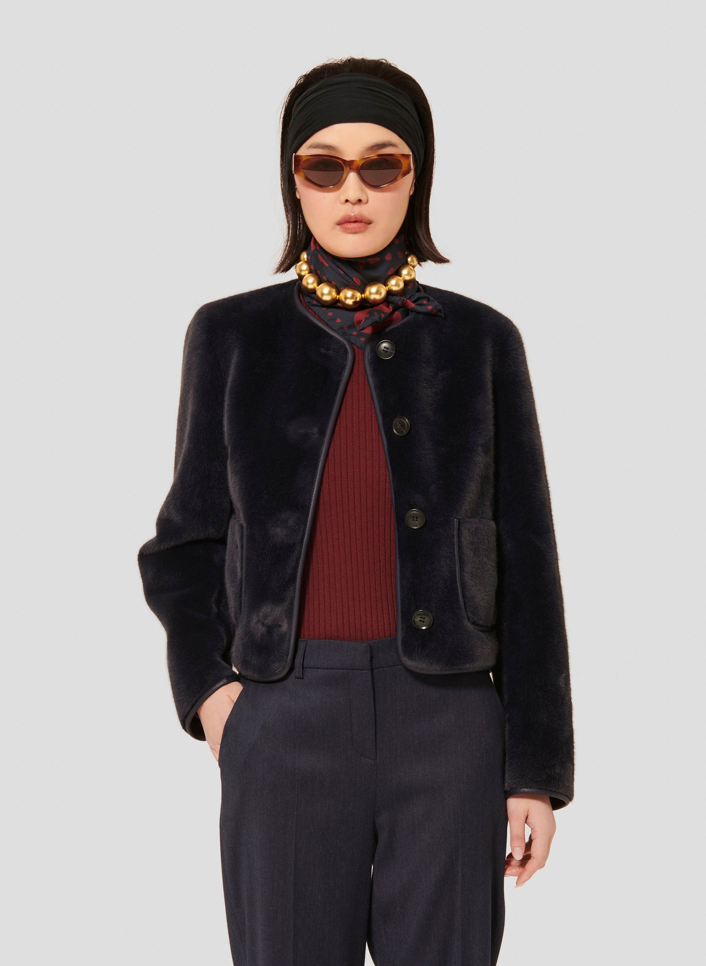 Short Midnight Blue Faux Fur Jacket with Round Neckline and Button Front.