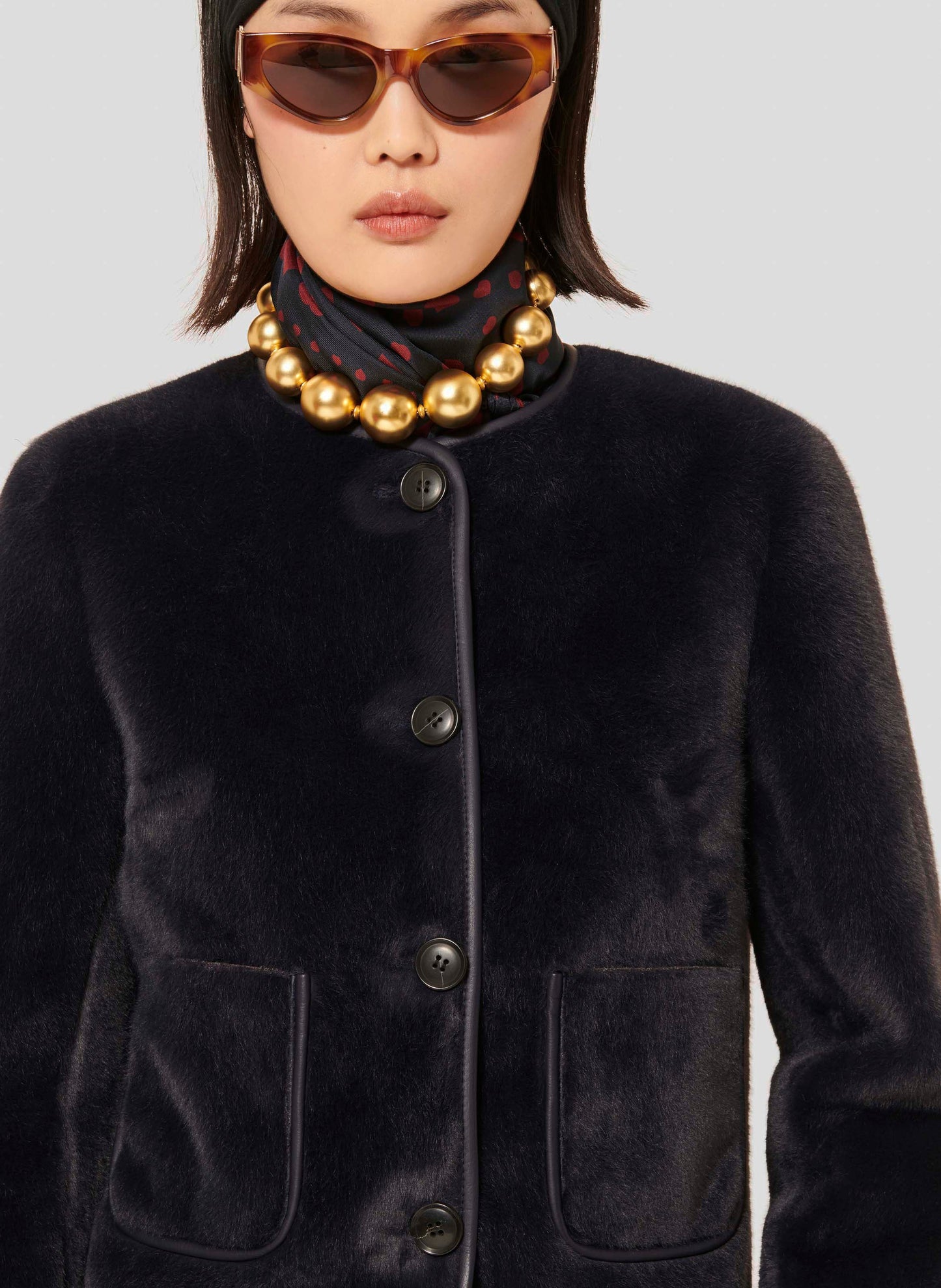 Cozy Midnight Blue Faux Fur Jacket with Round Neckline and Button Front.