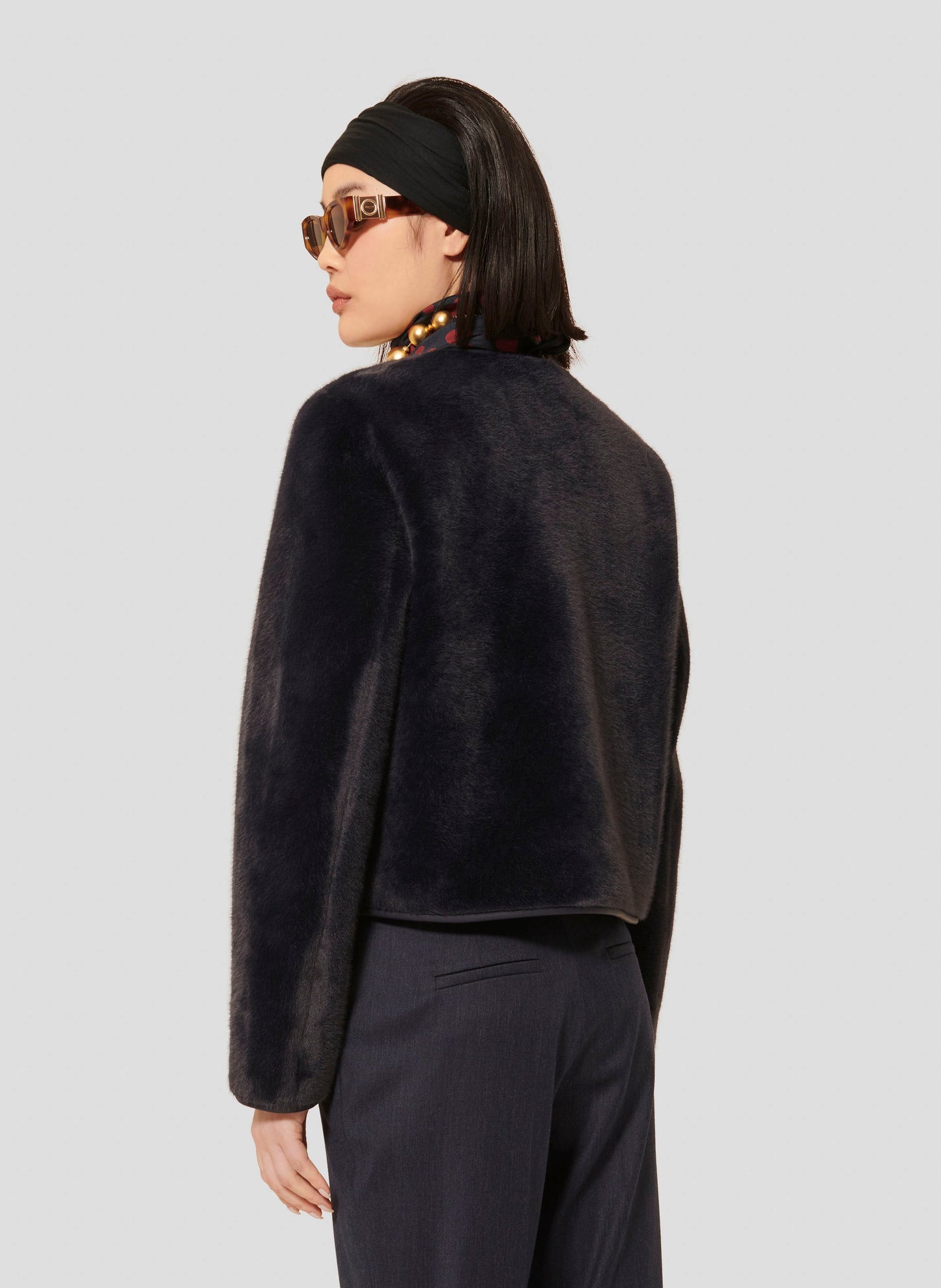 Warm Midnight Blue Faux Fur Jacket with Long Sleeves and Side Pockets.