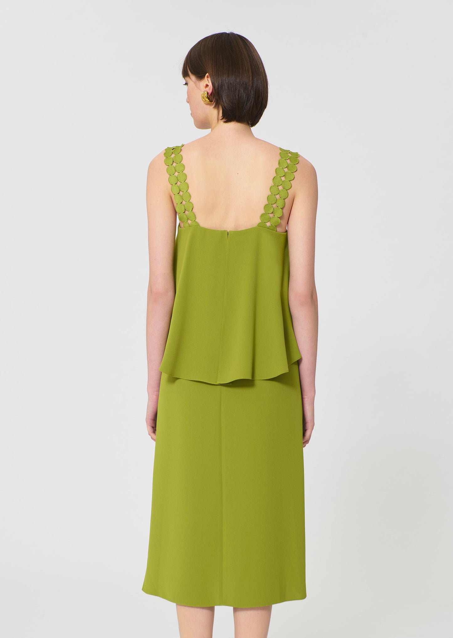 dress in green fluid crepe