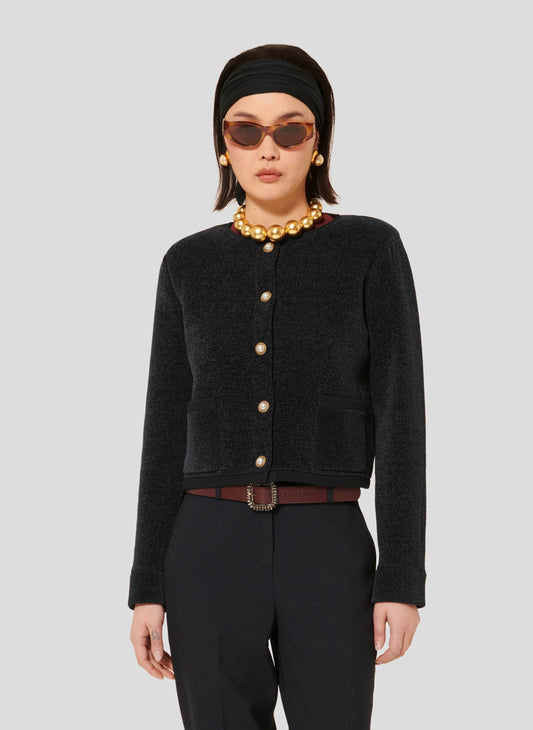 Tara Jarmon model wearing midnight blue compact knit cardigan.