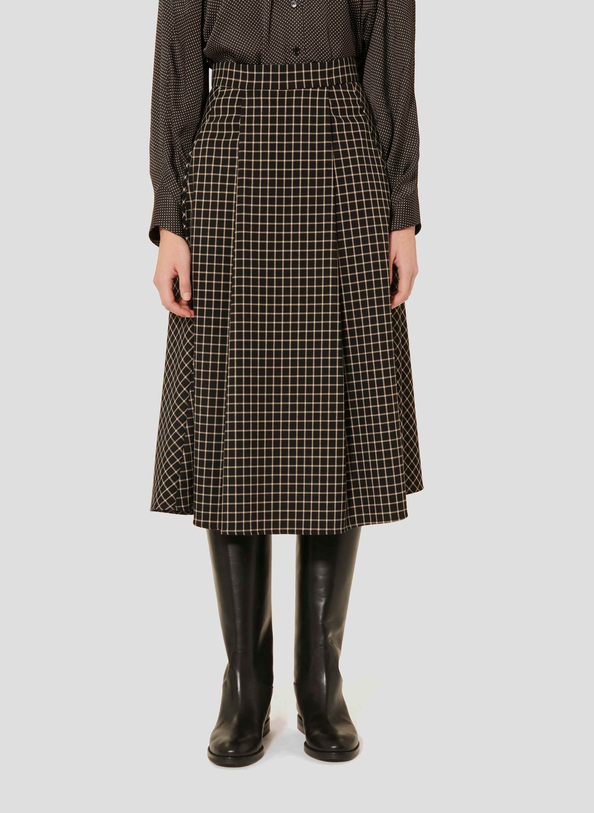 Tara Jarmon high waist, long black plaid skirt.