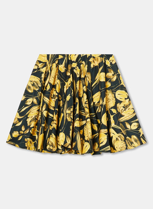 Tara Jarmon balloon cut, short black skirt with a yellow tulip print.