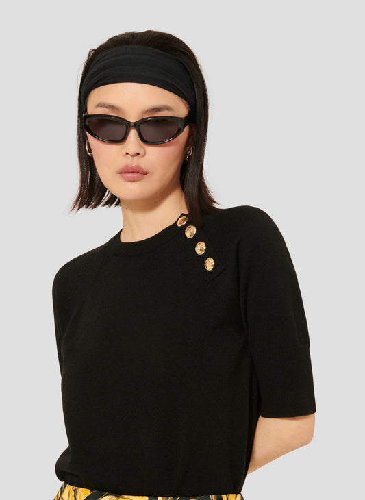Women's Soft Wool Black Sweater with Round Collar, Short Sleeves, and Gold Buttons.