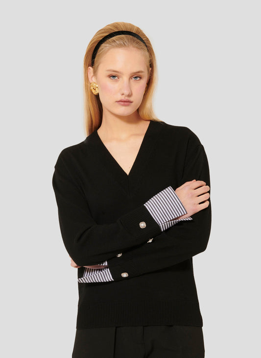 Luxurious Merino Wool Top in Black with Striped Cuffs and Jewel Button Detail.