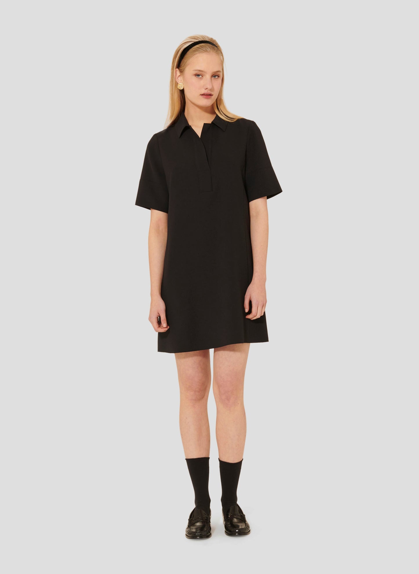 Stylish Black Short Dress with Shirt Collar and Flared Silhouette.