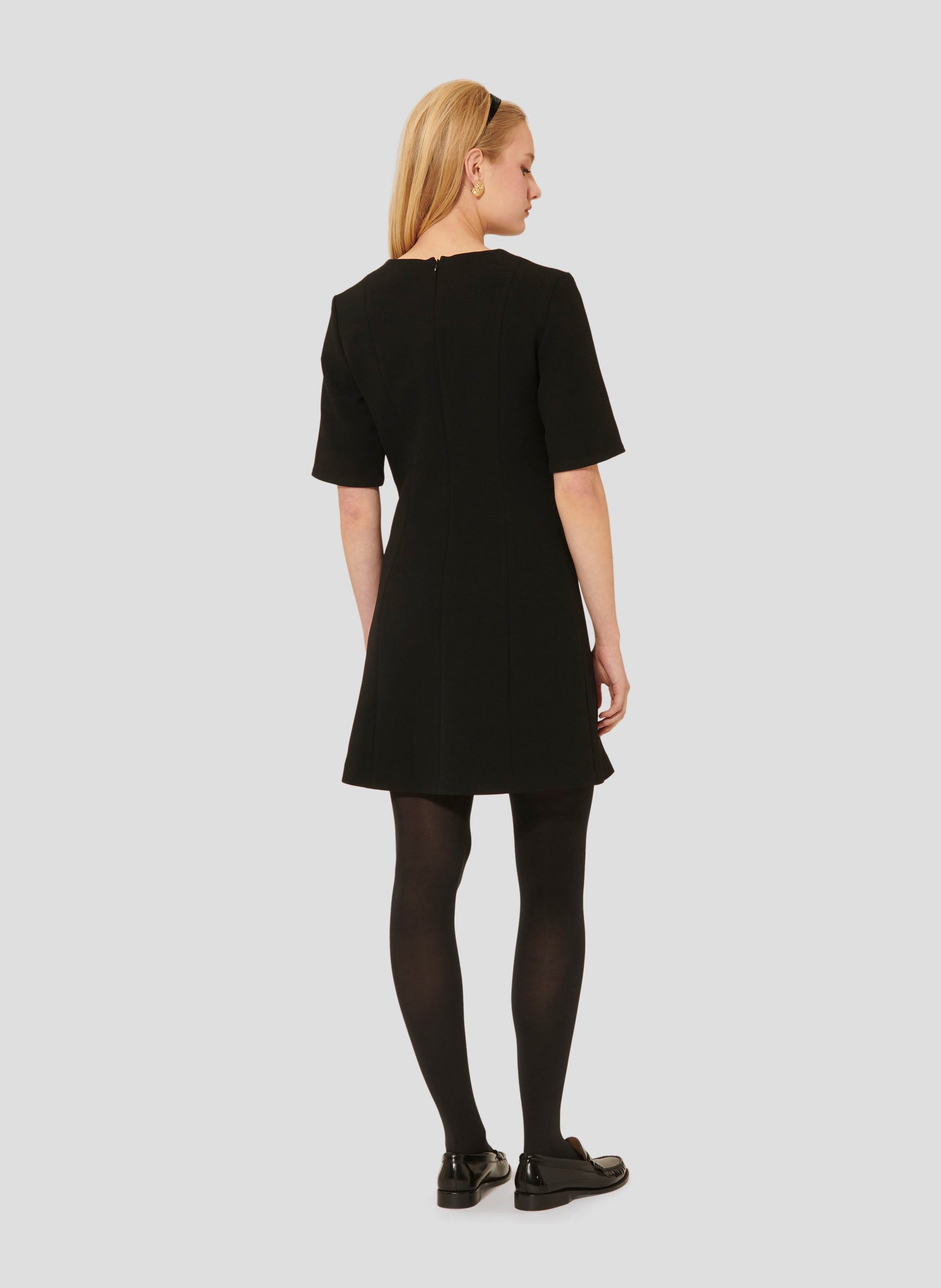 Short Sleeves Black Dress with Pleated Skirt and Invisible Zip on the Back.