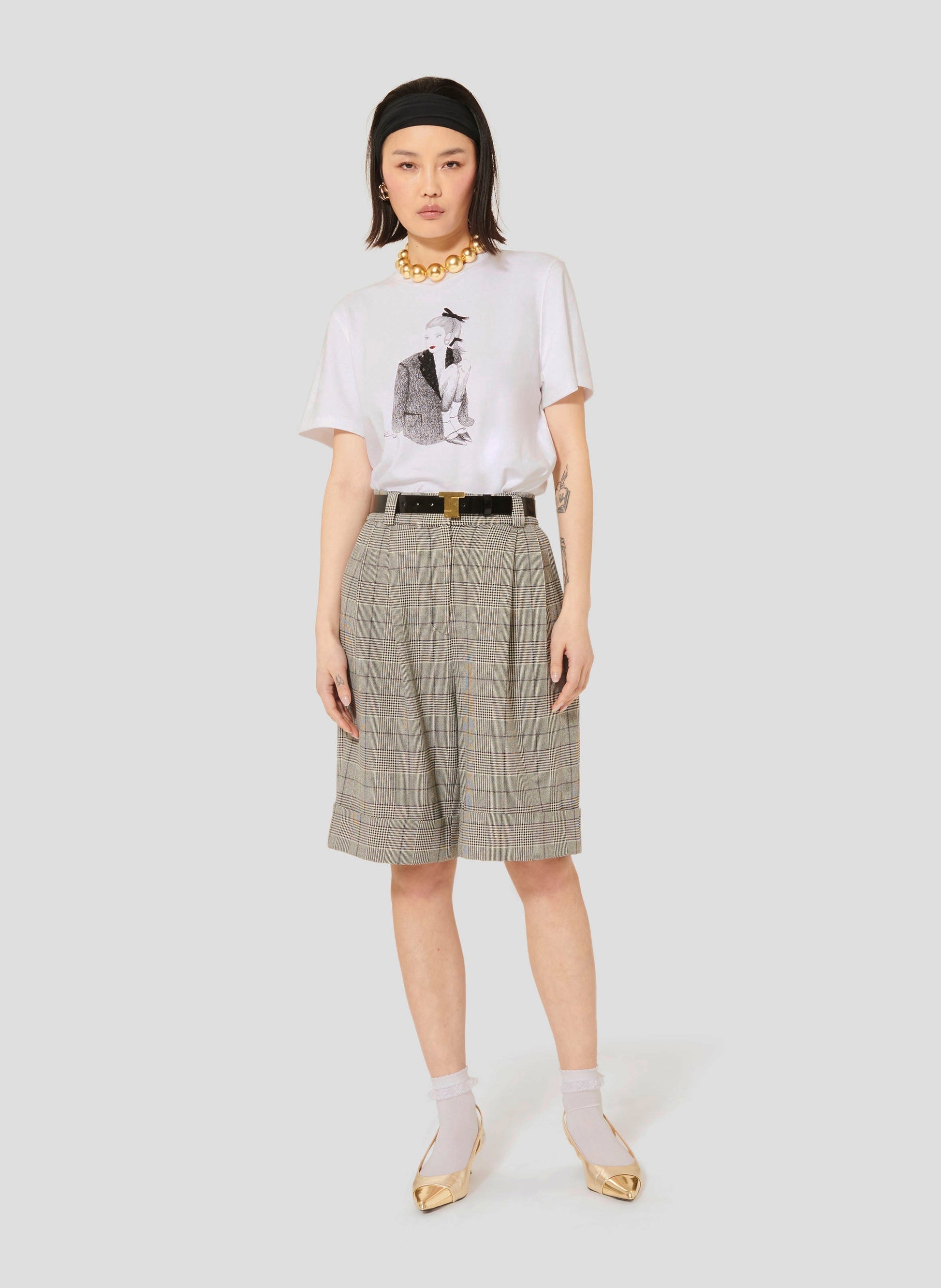 Casual short sleeves white t-shirt with straight cut and round neckline.