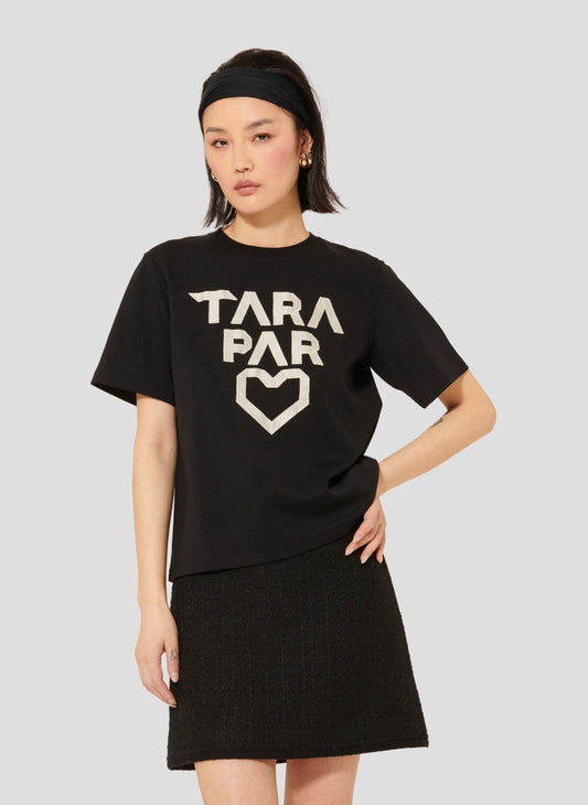 Model wearing Tara Jarmon Black Cotton t-shirt. 