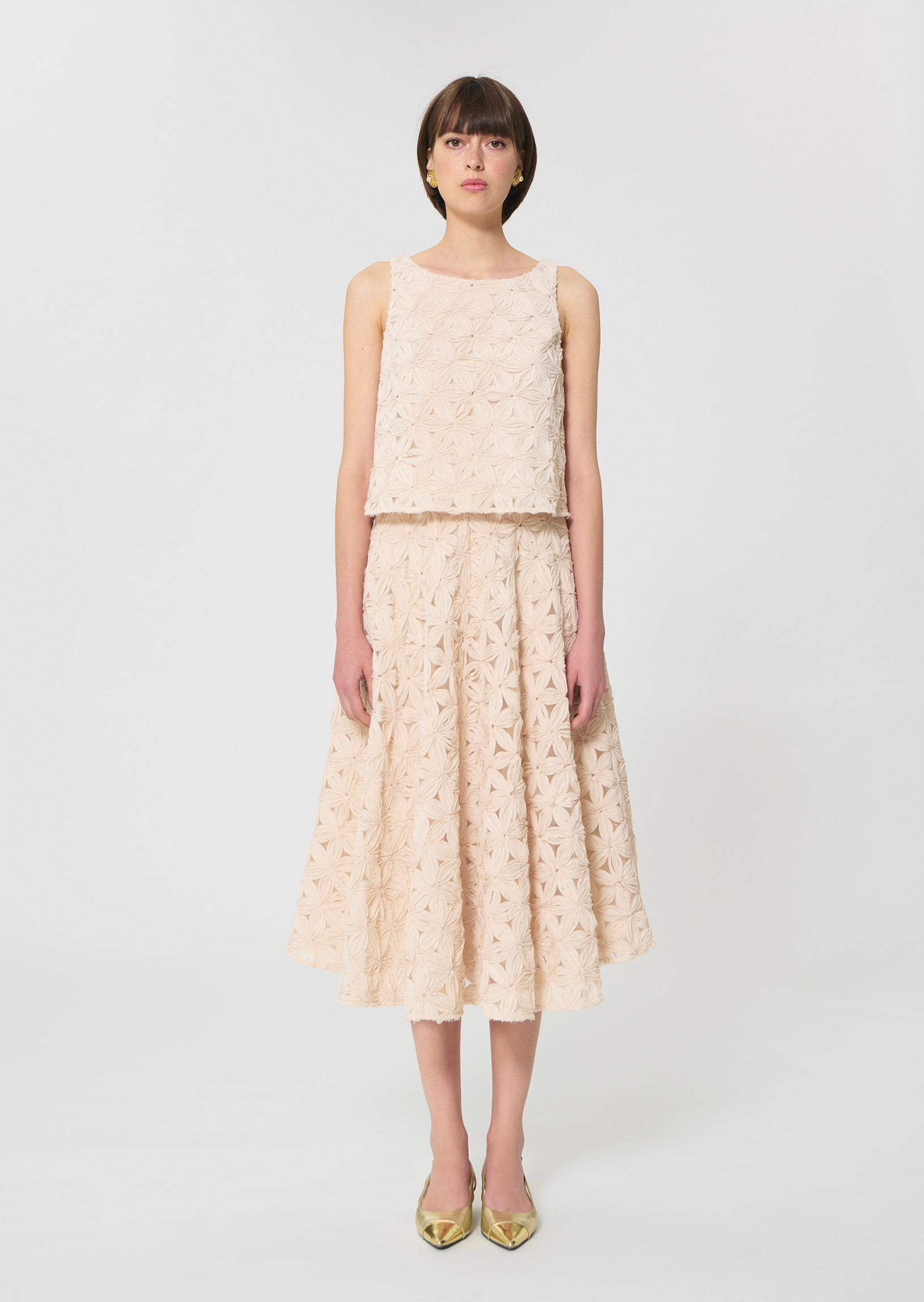 skirt in beige embossed floral pattern