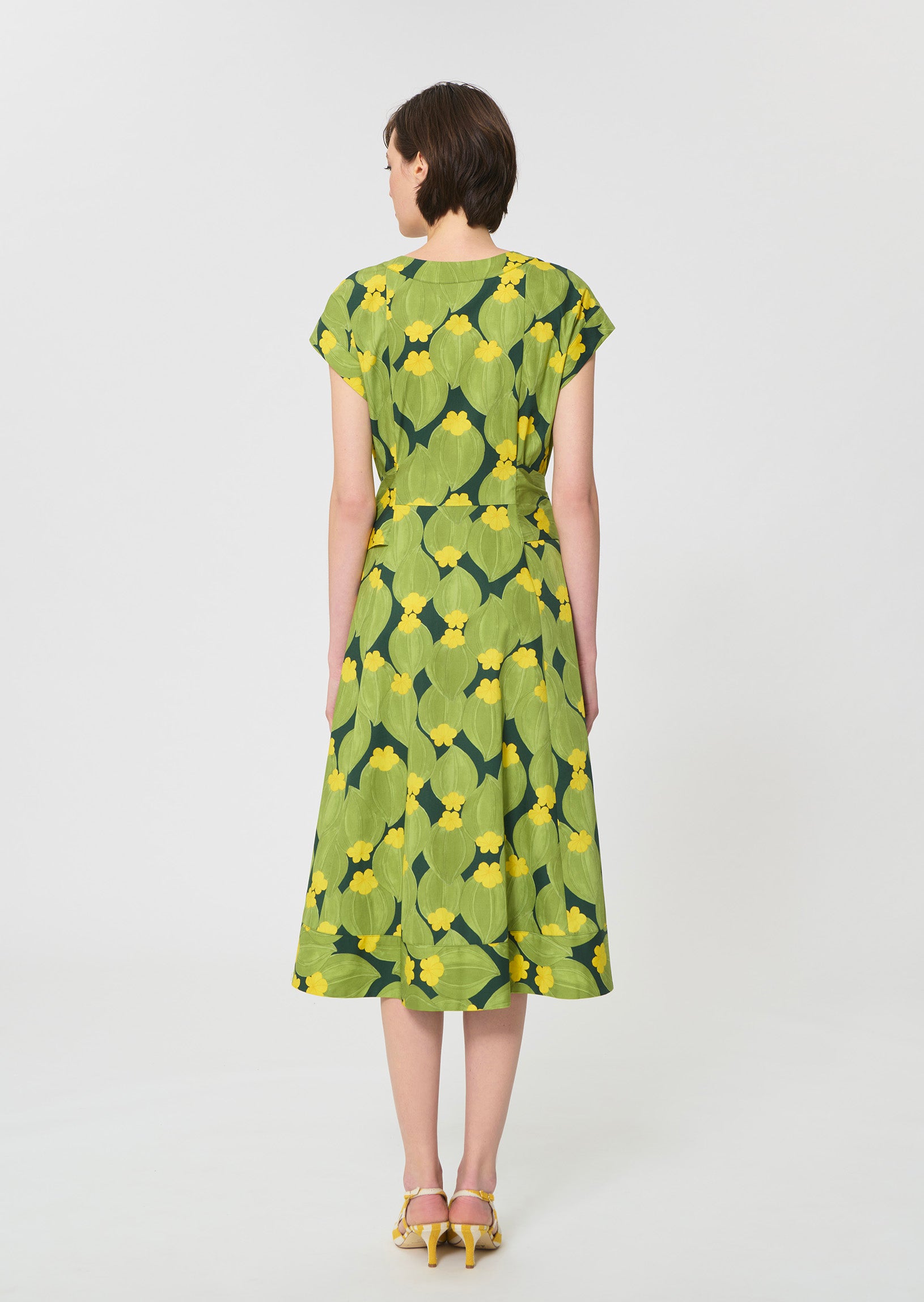 dress in dark green floral print